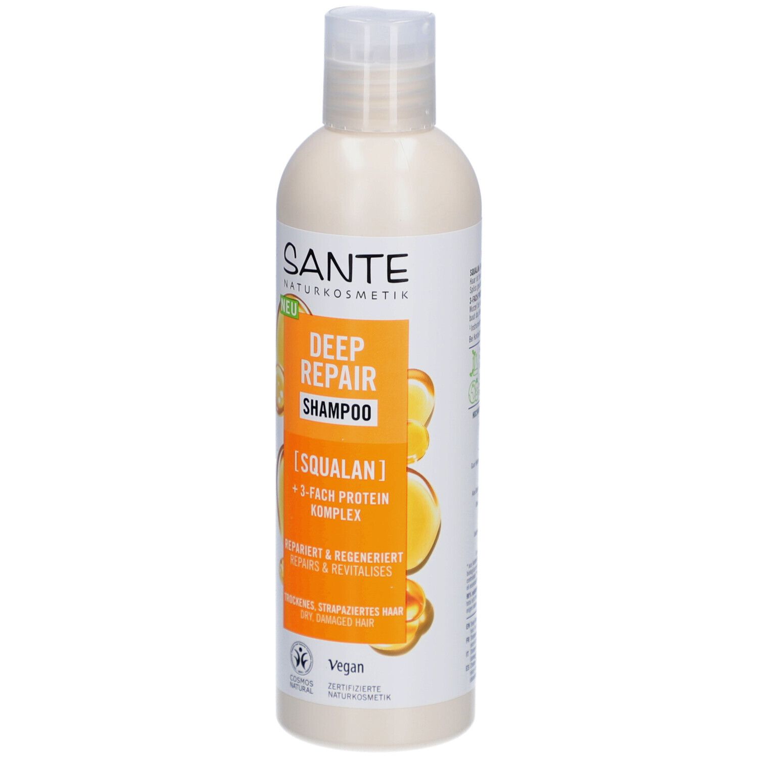Shampooing SANTE Deep Repair. Bouteille blanche avec étiquette jaune-orange. Texte: Deep Repair Shampoo, Squalane, complexe protéique 3x.