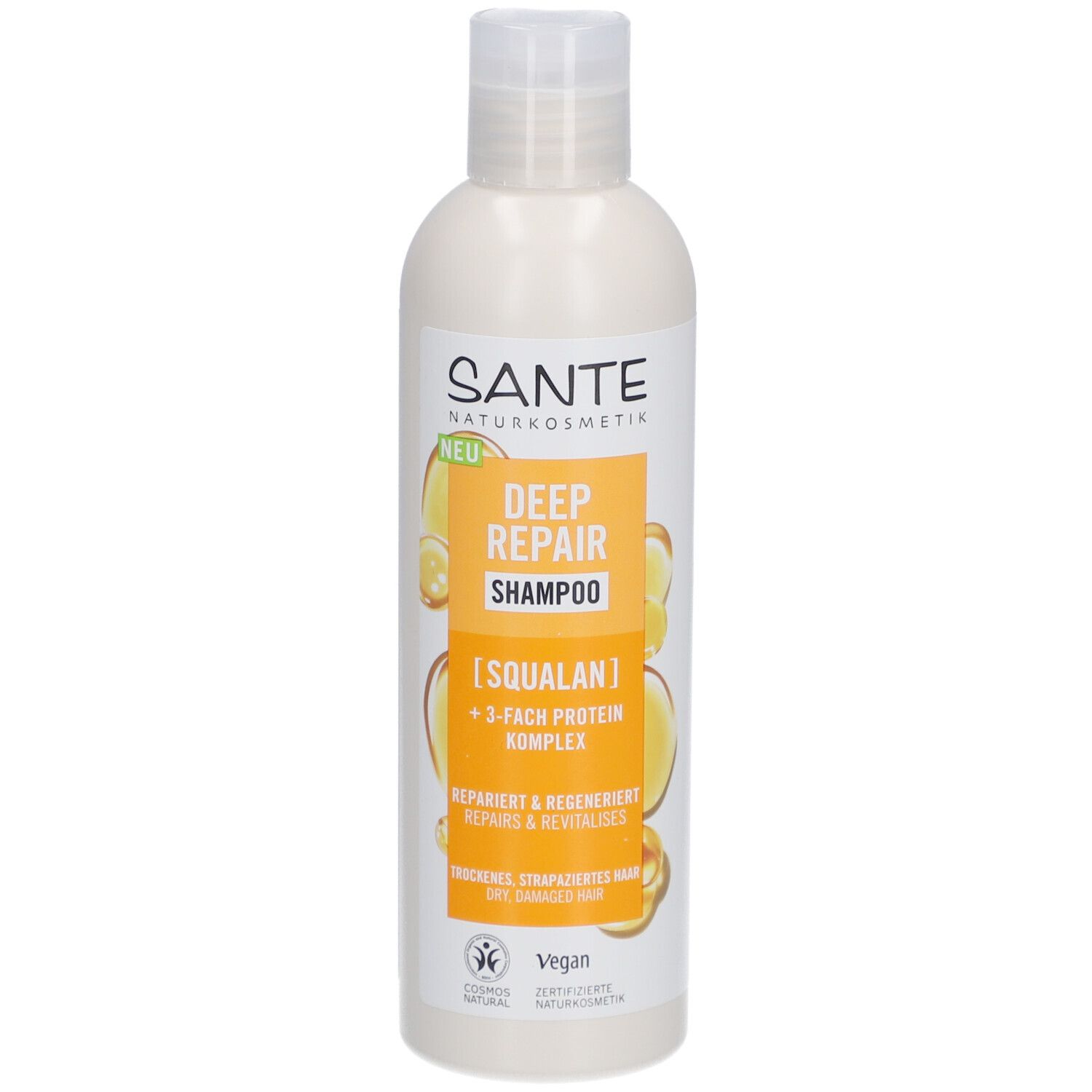 Shampoo SANTE Deep Repair. Bouteille blanche avec étiquette jaune-orange. Texte: Deep Repair Shampoo, Squalane, complexe protéique 3x.