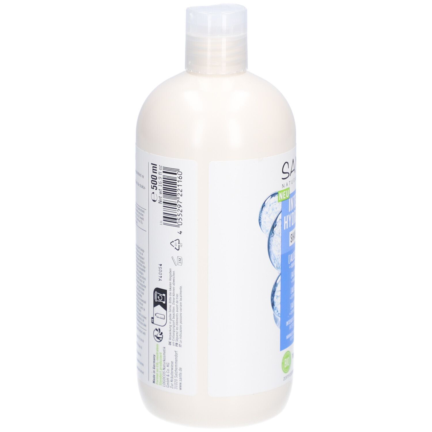 Flacon de shampooing blanchâtre, vue latérale. Étiquette avec texte et informations. 500 ml. Symboles de recyclage. Label Vegan.