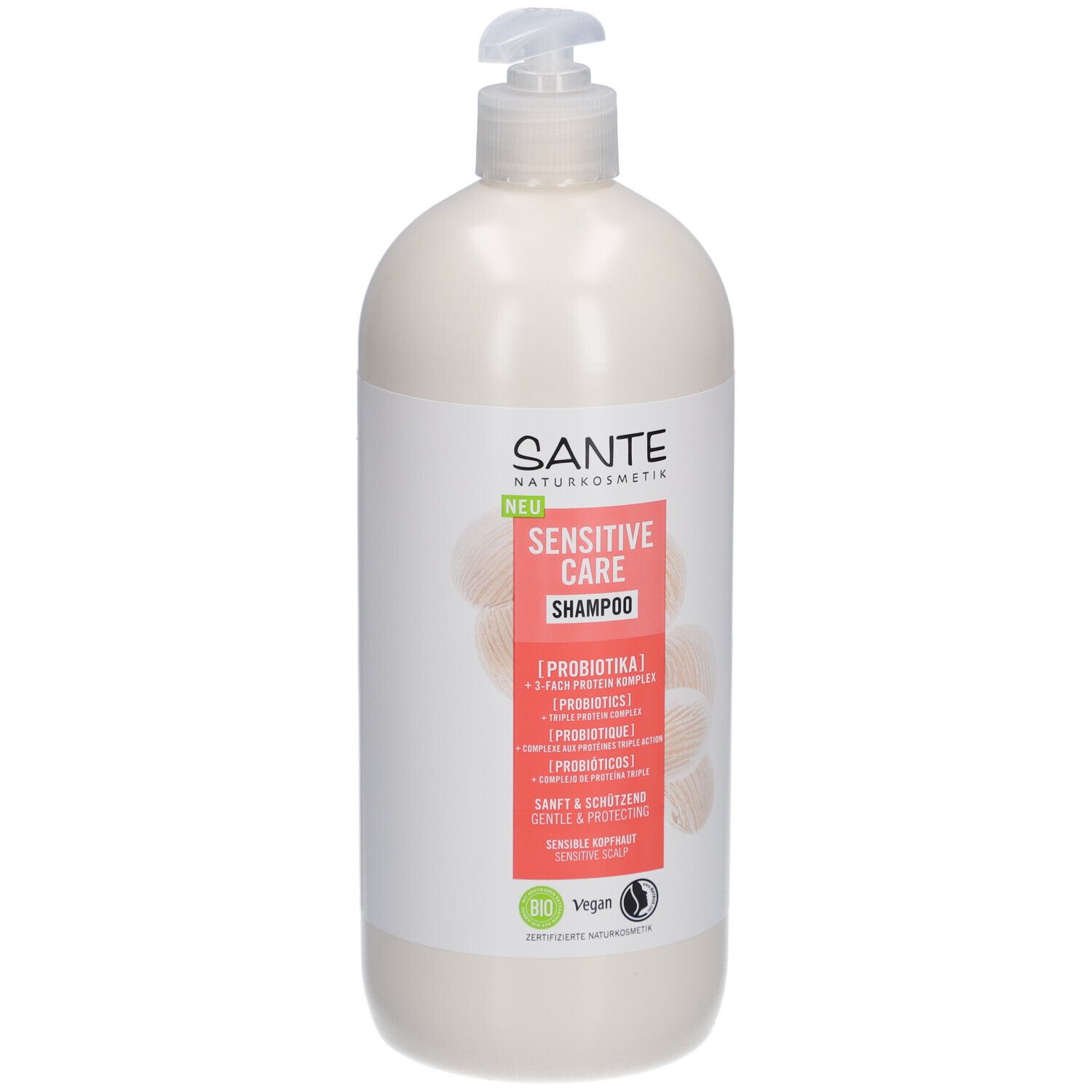 Flacon de shampooing beige avec pompe. Inscription: SANTE Sensitive Care Shampoo. Labels bio et vegan.