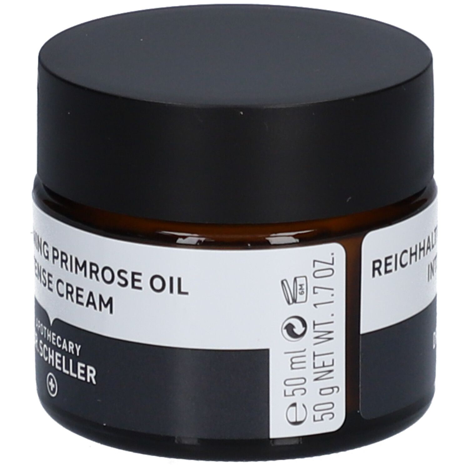 Pot de crème brun avec couvercle noir. Nom du produit sur étiquette blanche. 50 ml, 50 g.