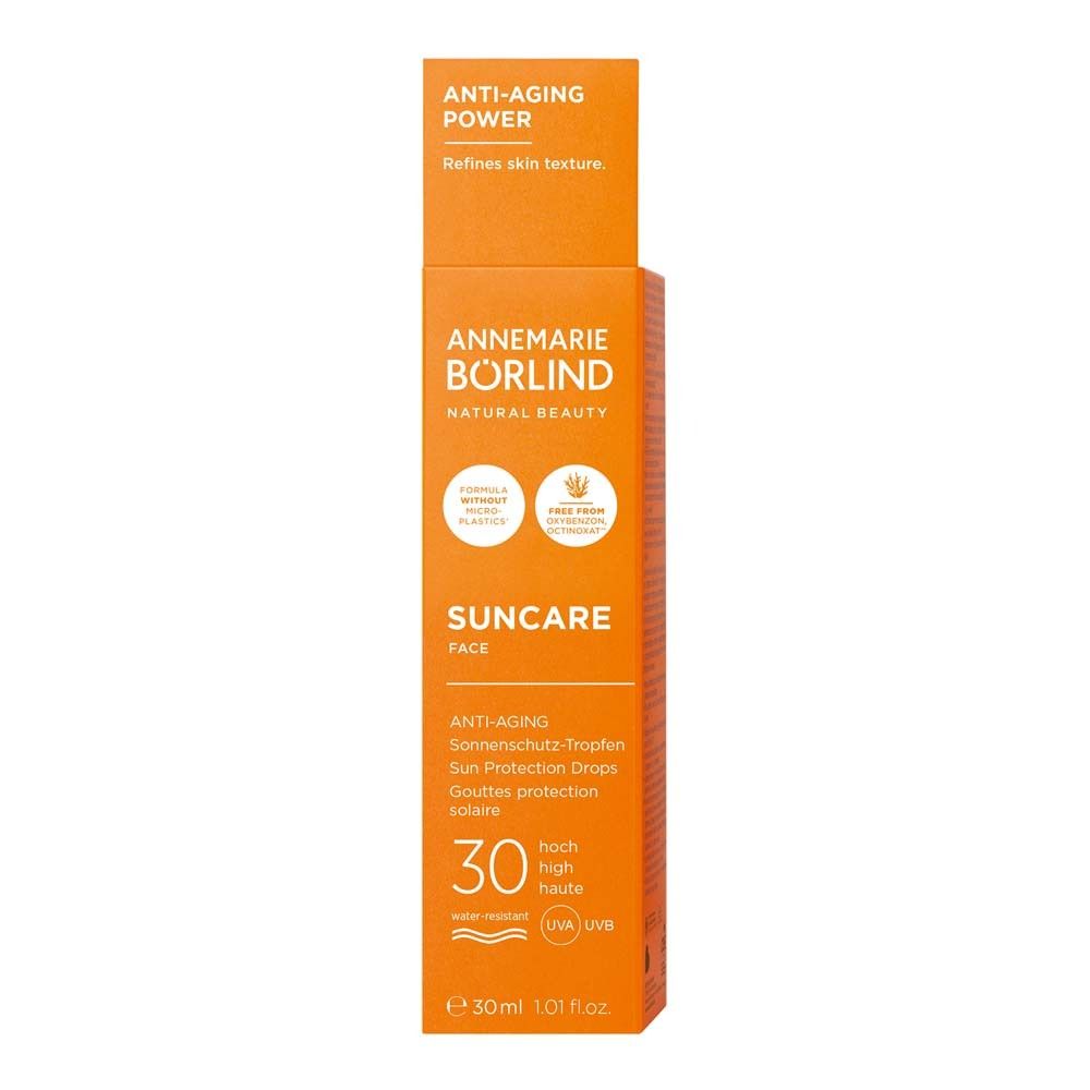 Produit et emballage. Inscription : Suncare Face, Anti-Âge, SPF 30. Texte : Pouvoir anti-âge.