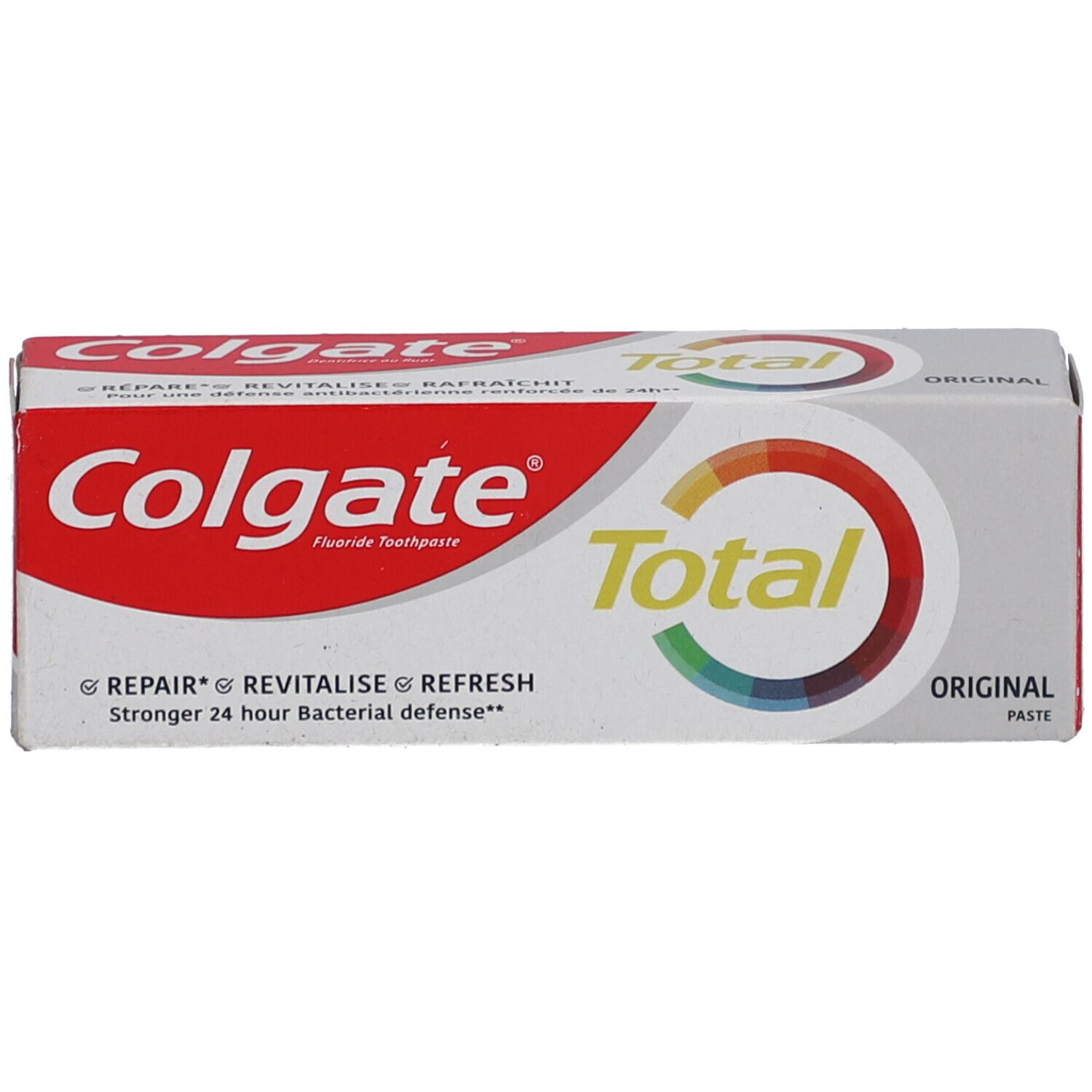 Emballage de dentifrice Colgate Total Original. Blanc, rouge et accents colorés. Inscription : Colgate Total Original.