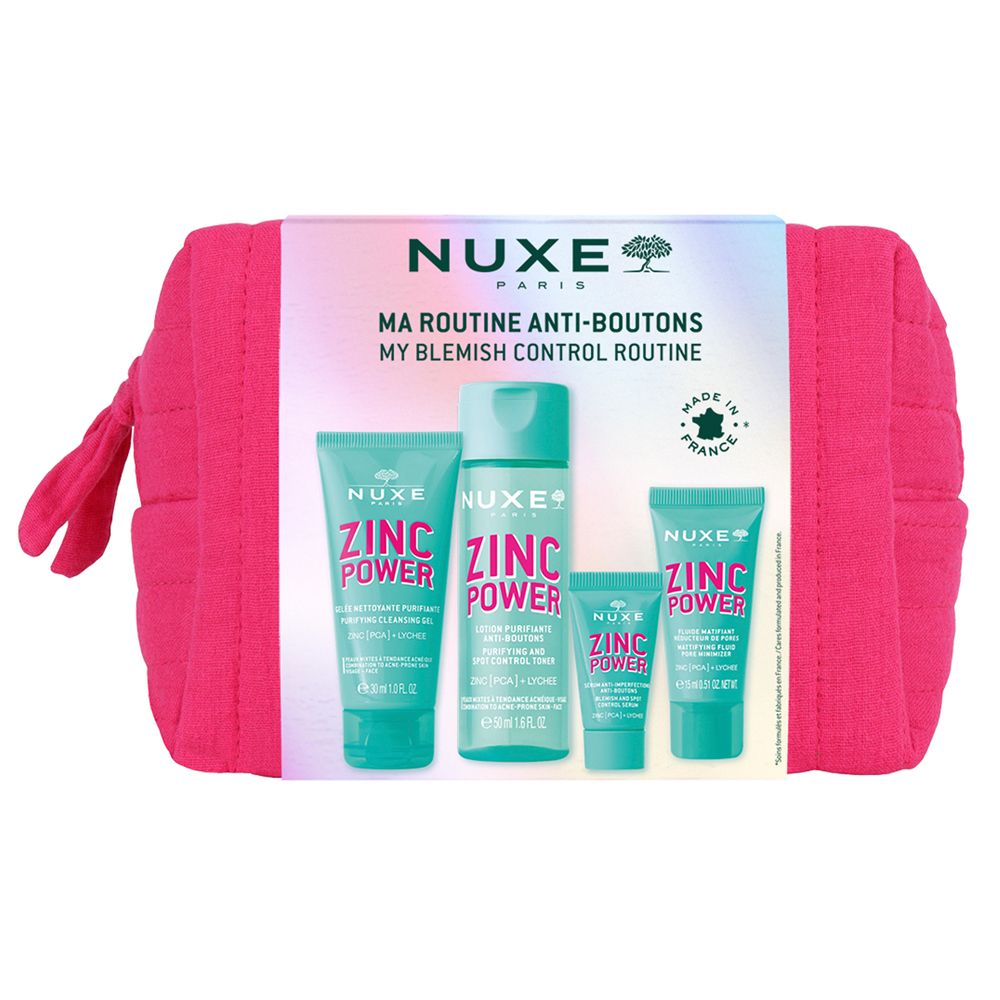 Trousse rose avec quatre produits. Inscriptions "NUXE PARIS" et "ZINC POWER" sur l'emballage.