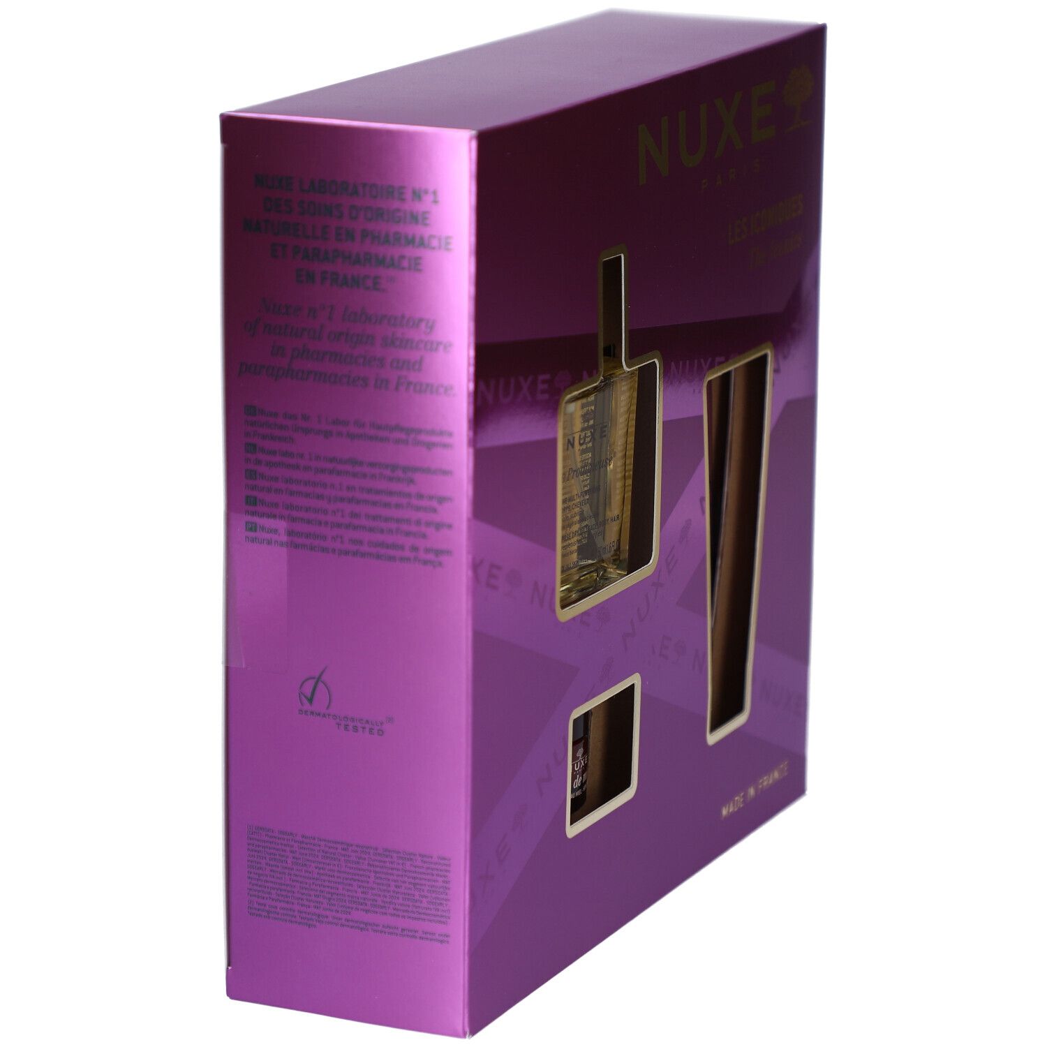 Vue latérale du coffret cadeau violet. Le nom de la marque NUXE est visible. Texte multilingue. "Made in France" est également visible.