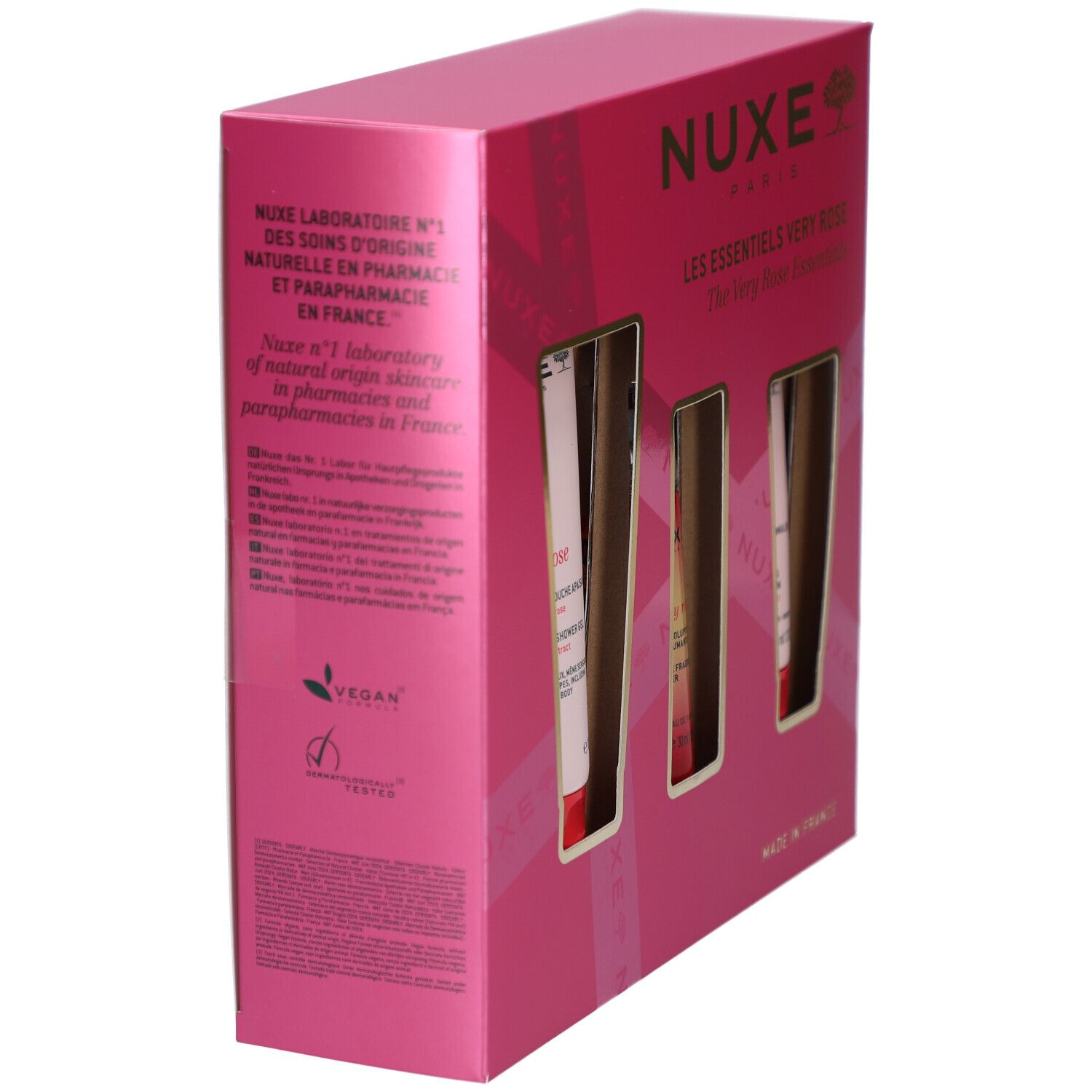 Coffret rose, vue latérale. Texte sur le laboratoire NUXE et les ingrédients. Logo Vegan et "Testé dermatologiquement".