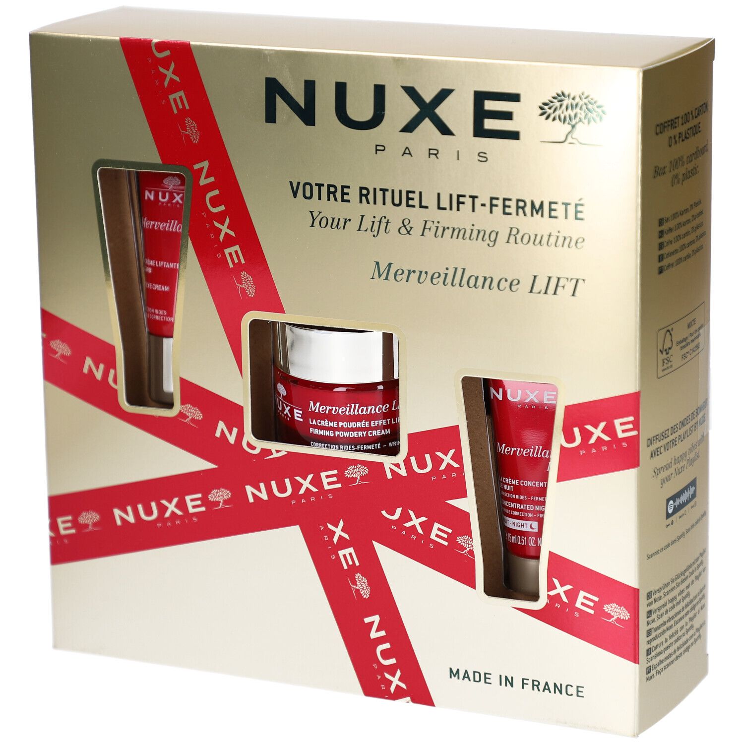 Coffret cadeau NUXE doré avec ruban rouge. Contient trois produits cosmétiques. Inscriptions: NUXE, Merveillance Lift.