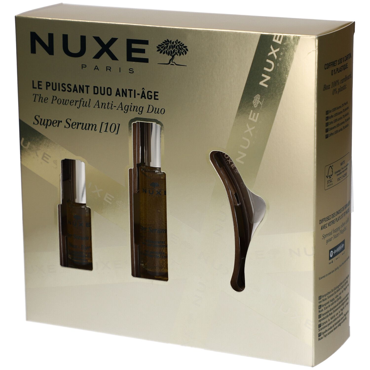Coffret cadeau NUXE. Contient deux sérums et un outil de massage. Emballage doré avec nom et logo du produit.