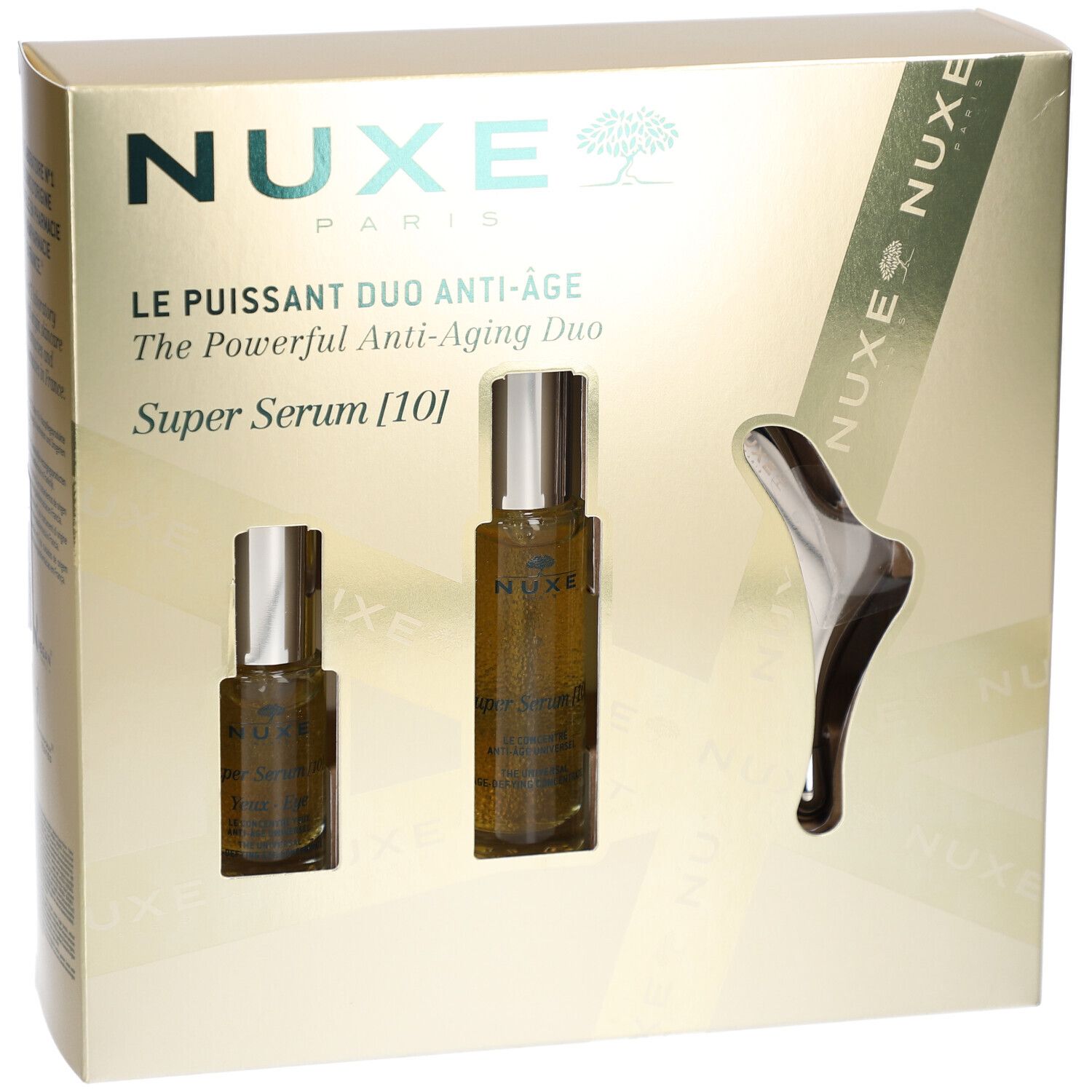 Coffret cadeau avec deux sérums et un outil de massage. Nom du produit et logo visibles.