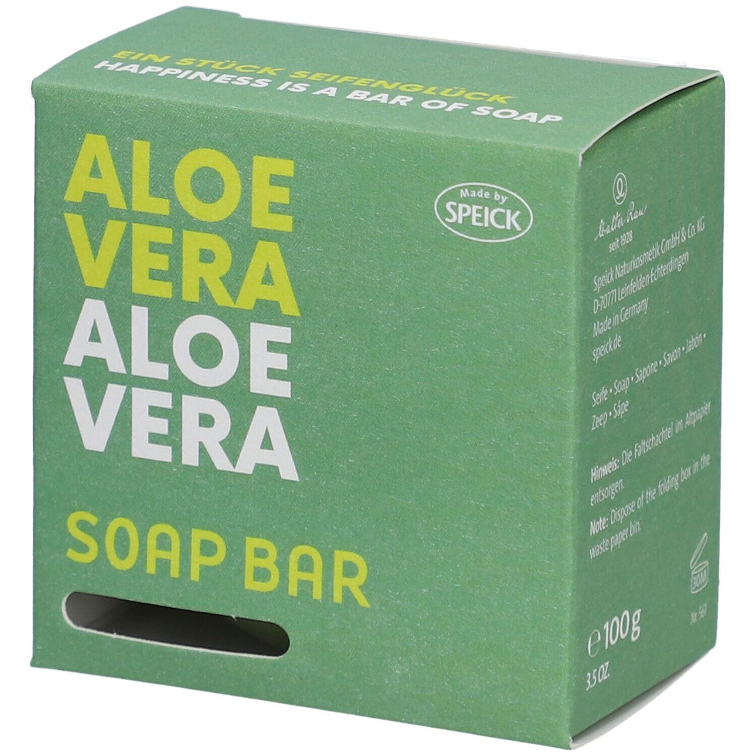 Emballage vert avec "ALOE VERA" et "SOAP BAR" en blanc. Marque "Speick". Trou pour l'extraction.