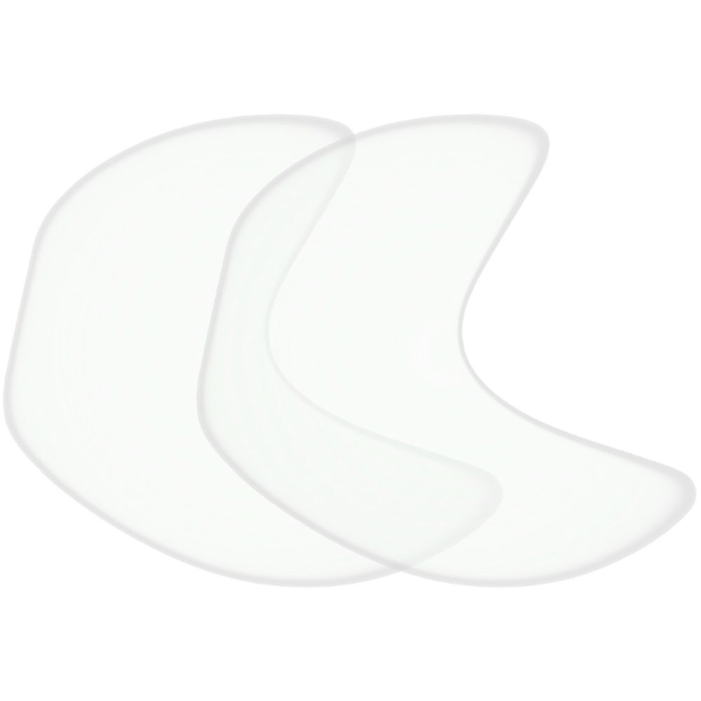 Deux coussinets transparents en forme de croissant pour les yeux et les tempes. Légèrement incurvés, surface lisse.