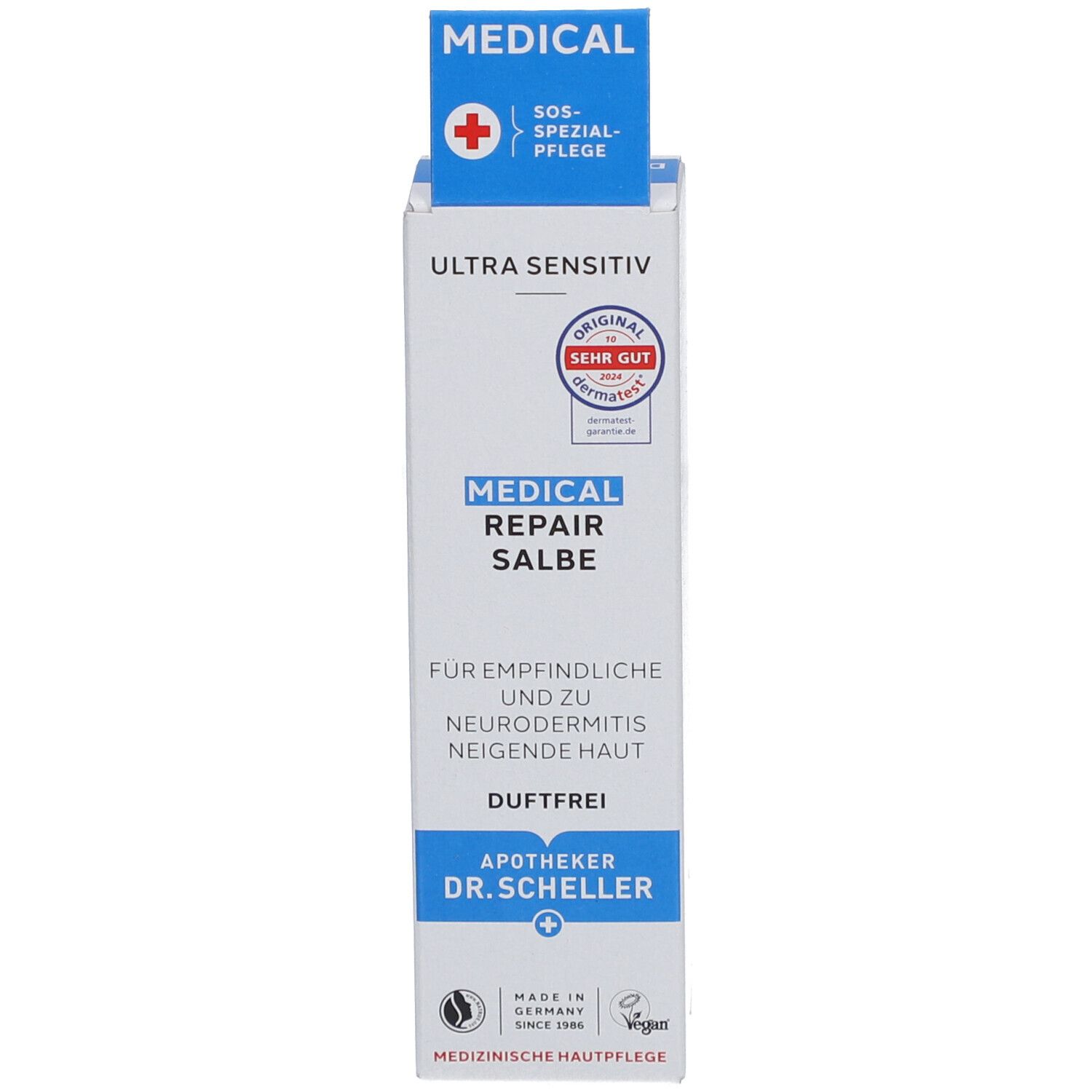 Emballage du produit. Inscription: MEDICAL REPAIR SALBE. Pour peaux sensibles. Apotheker Dr. Scheller. Vegan.
