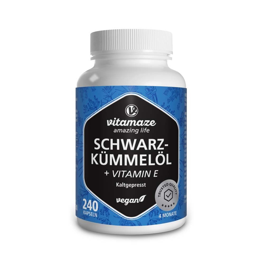 Flacon blanc avec capsules noires. Inscription : Huile de cumin noir + vitamine E, végétalien. 240 capsules.