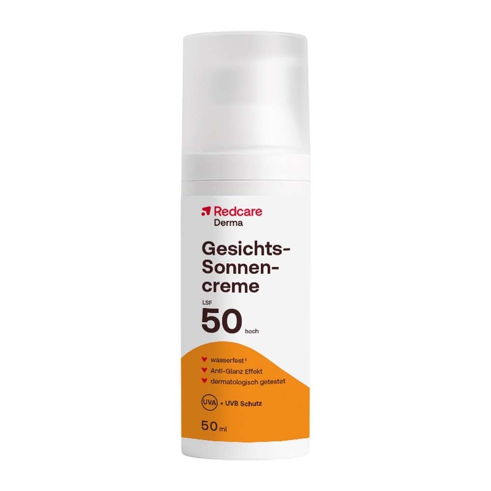 Redcare Derma Crème solaire visage SPF 50. Flacon blanc avec pompe. Zone orange avec informations produit.