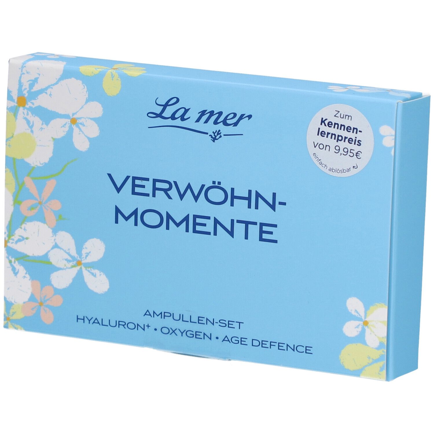 Boîte bleu clair avec motif floral. Inscription : La mer, VERWÖHN-MOMENTE, Ampullen-Set. Étiquette de prix.