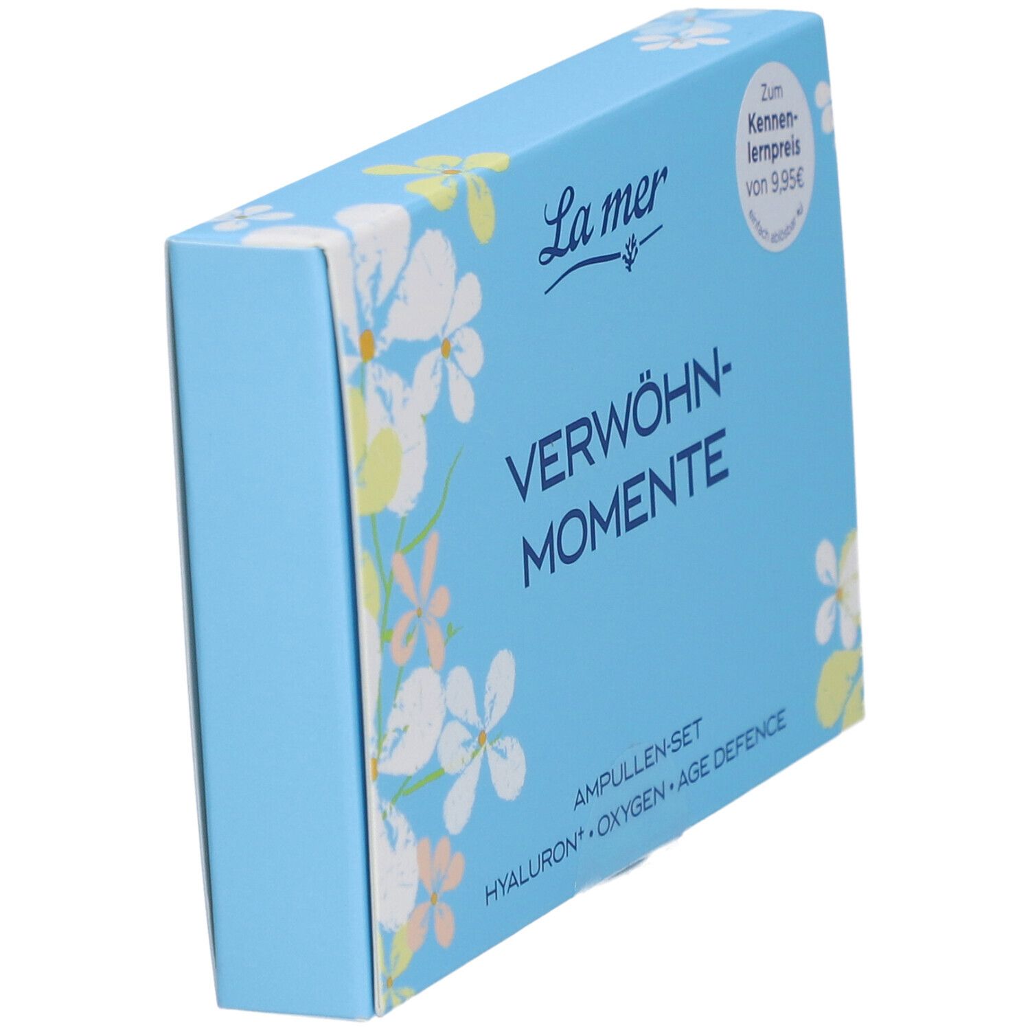 Boîte bleu clair en biais. Inscription : La mer, VERWÖHN-MOMENTE, Ampullen-Set. Étiquette de prix.