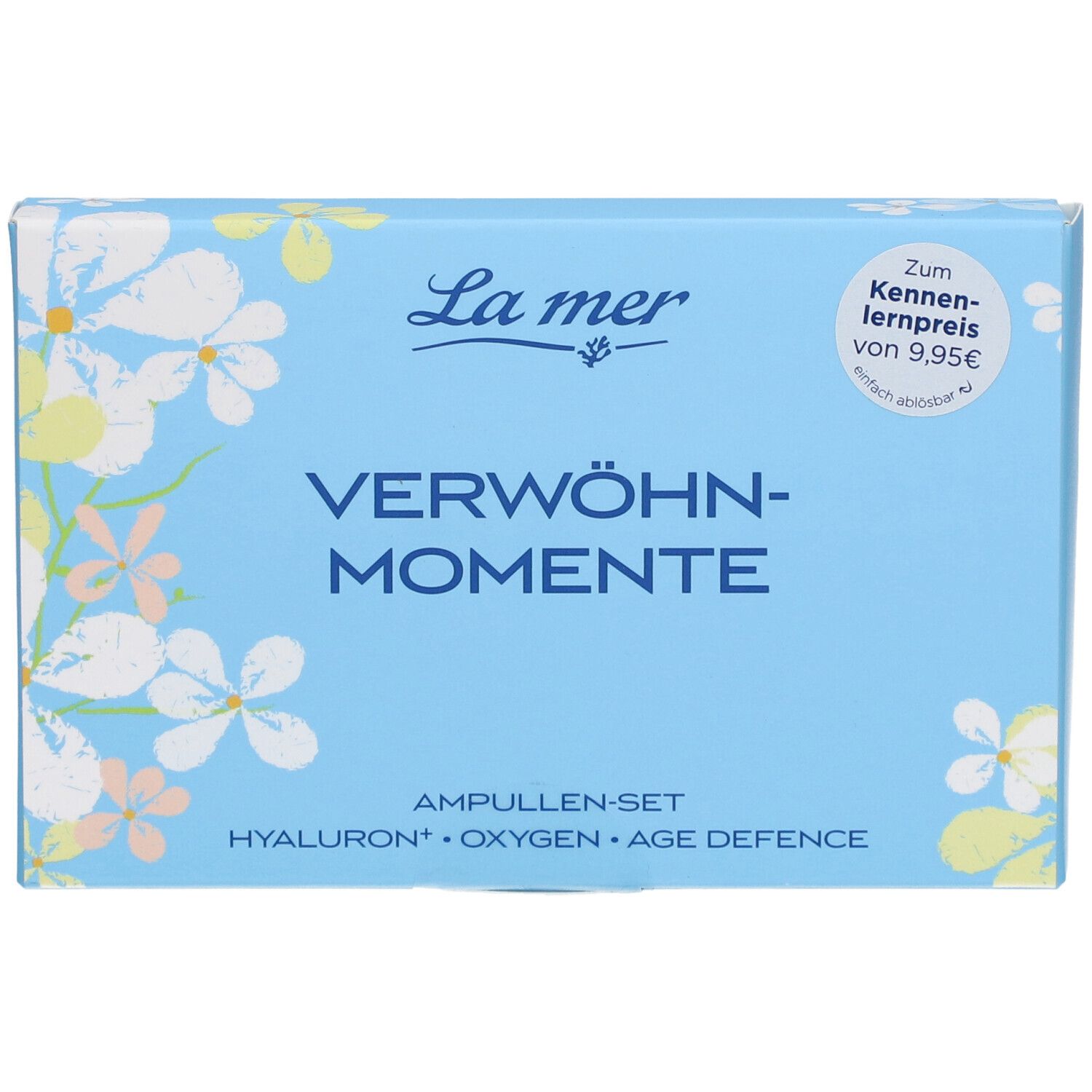 Boîte bleu clair avec motif floral. Inscription : La mer, VERWÖHN-MOMENTE, Ampullen-Set. Étiquette de prix.