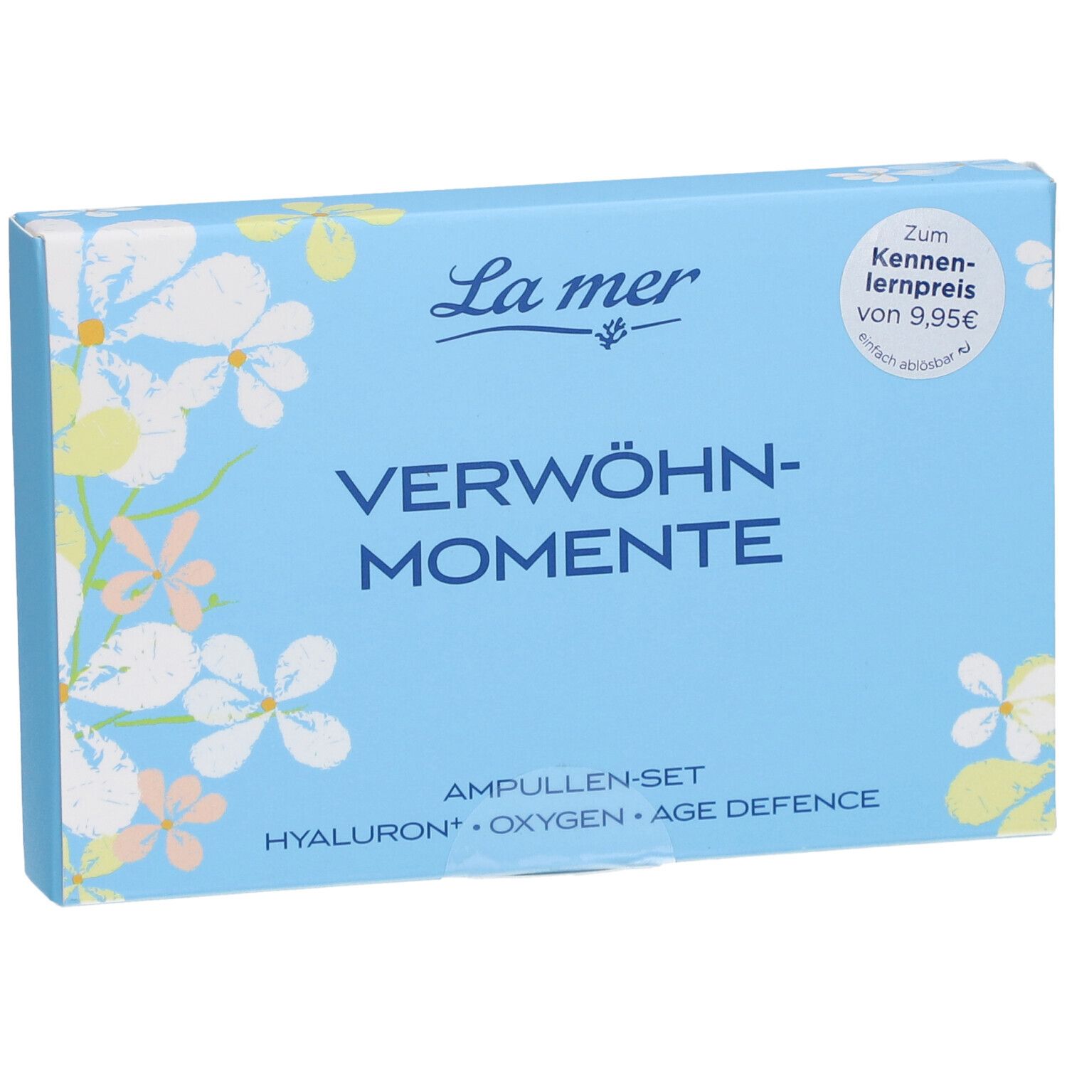 Boîte bleu clair avec motif floral. Inscription : La mer, VERWÖHN-MOMENTE, Ampullen-Set. Étiquette de prix.