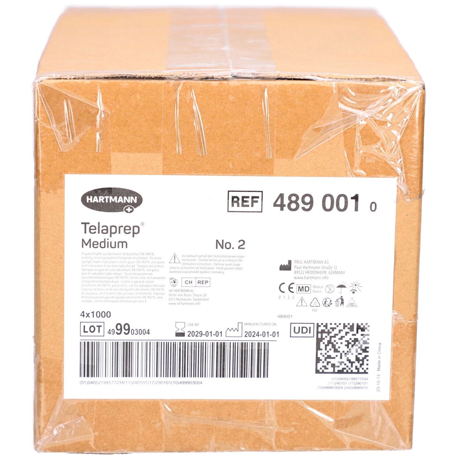 Boîte en carton Telaprep Medium. Étiquette avec informations produit, numéro de lot, date d'expiration et code-barres. Logo Hartmann.