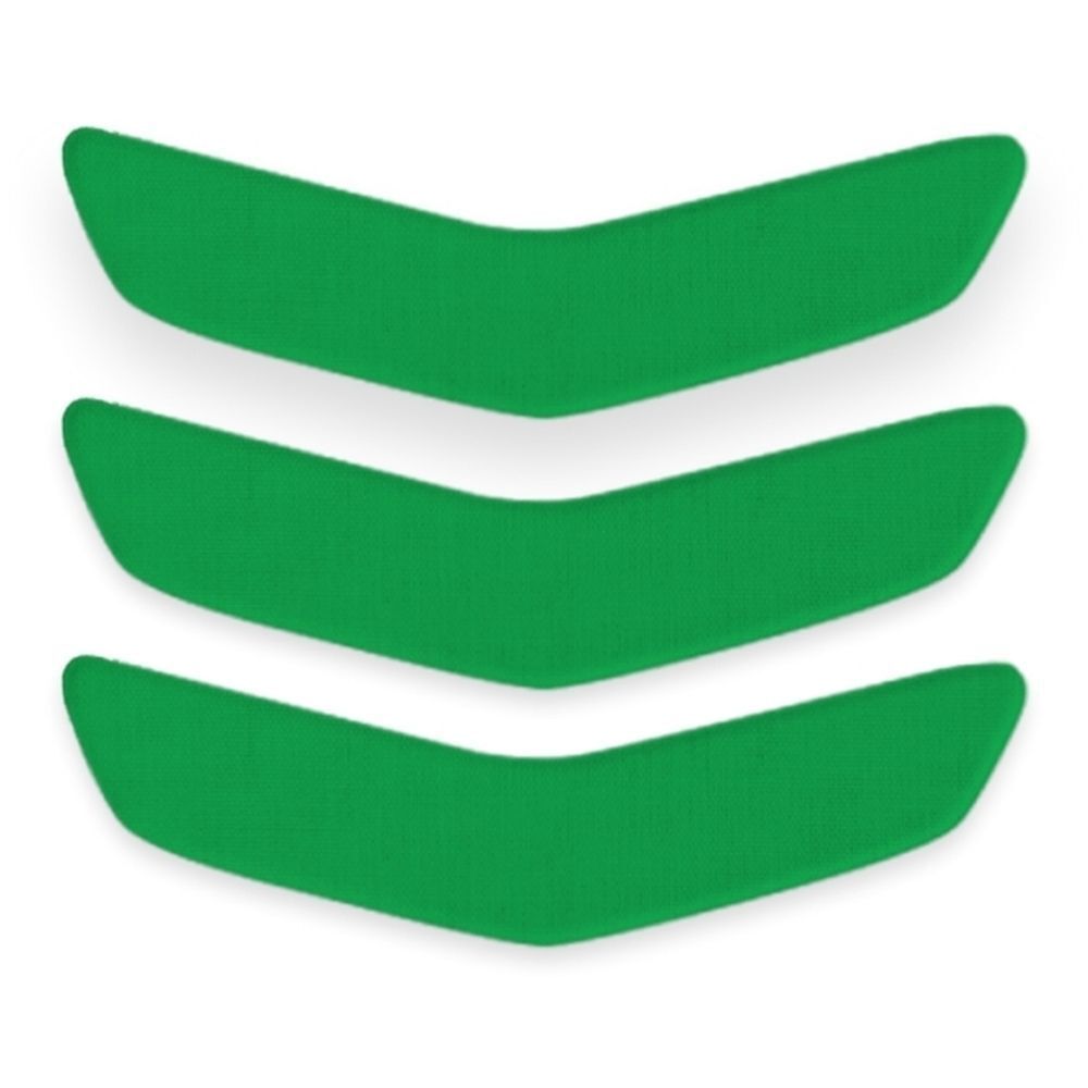Trois patchs buccaux verts en forme de flèche, disposés côte à côte.