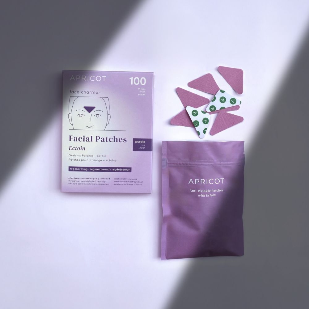 APRICOT Facial Patches avec Ectoin. Boîte, sachet et patchs. Emballage violet.
