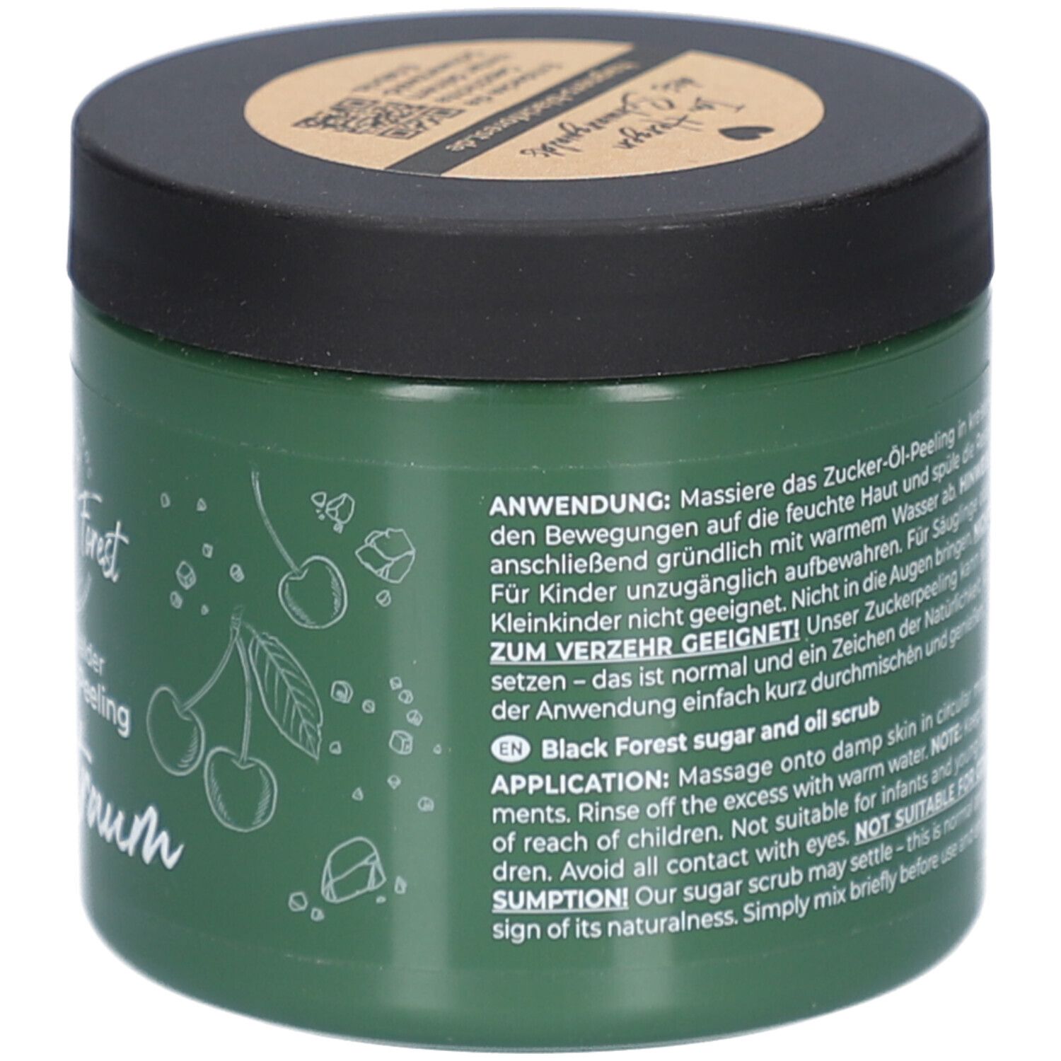 Pot vert avec texte. Texte: Application, ne convient pas aux enfants, Black Forest sugar and oil scrub, application.