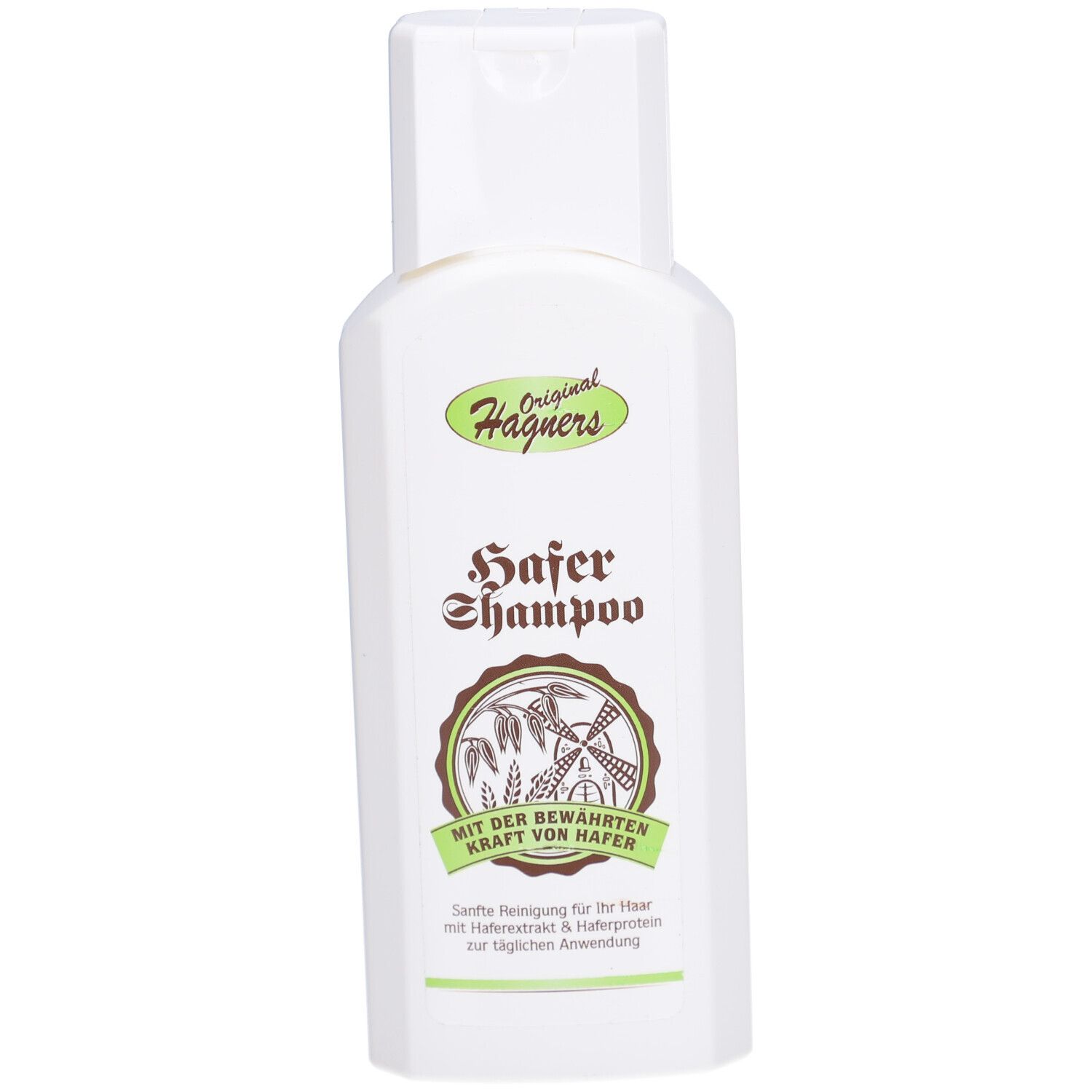 Flacon blanc avec étiquette verte. Inscription : Original Hägners Hafer Shampoo. Avec la puissance choisie de l'avoine.