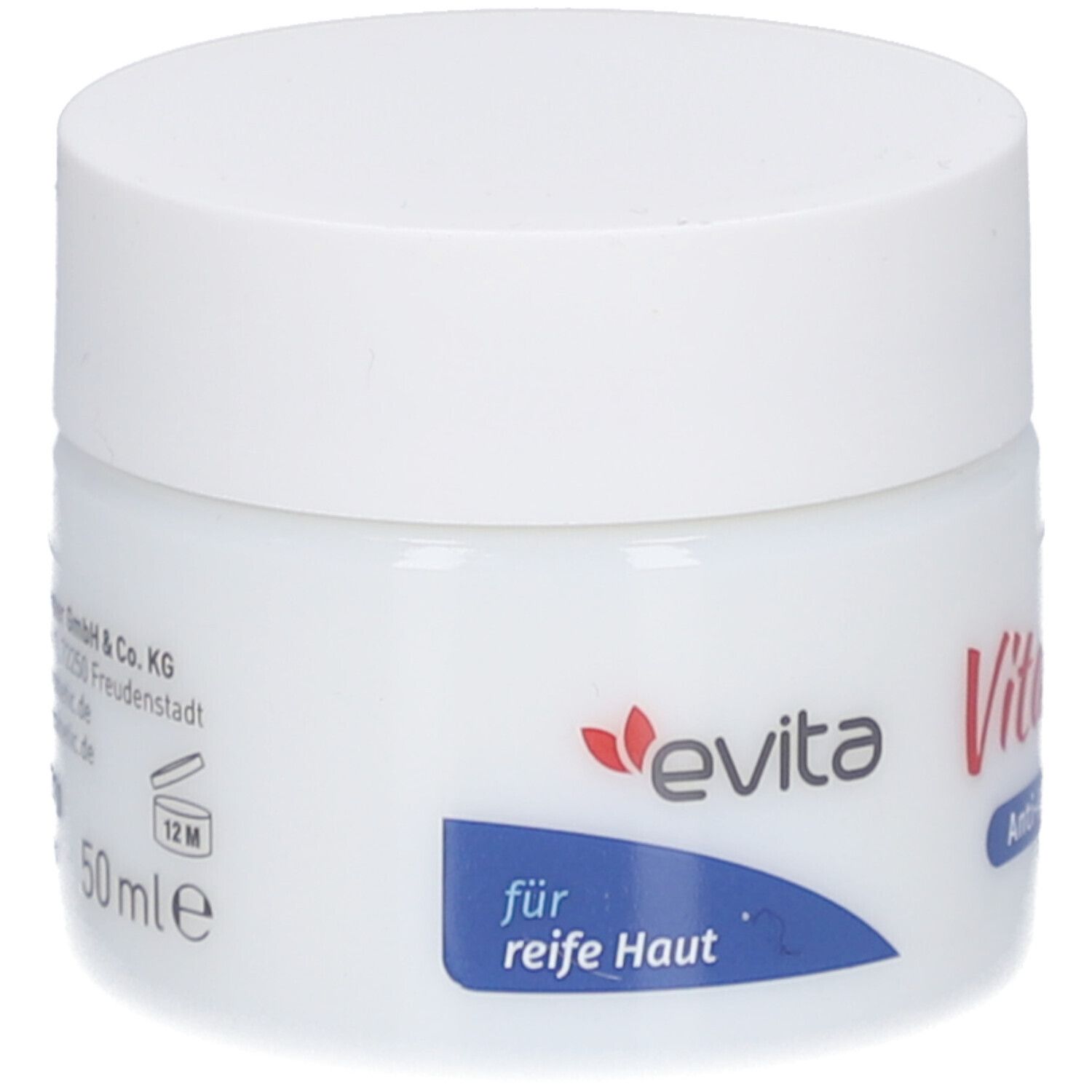 Pot blanc avec bouchon à vis. Inscription : evita, Vital Care Anti-Age Nachtpflege, pour peau mature. 50 ml.