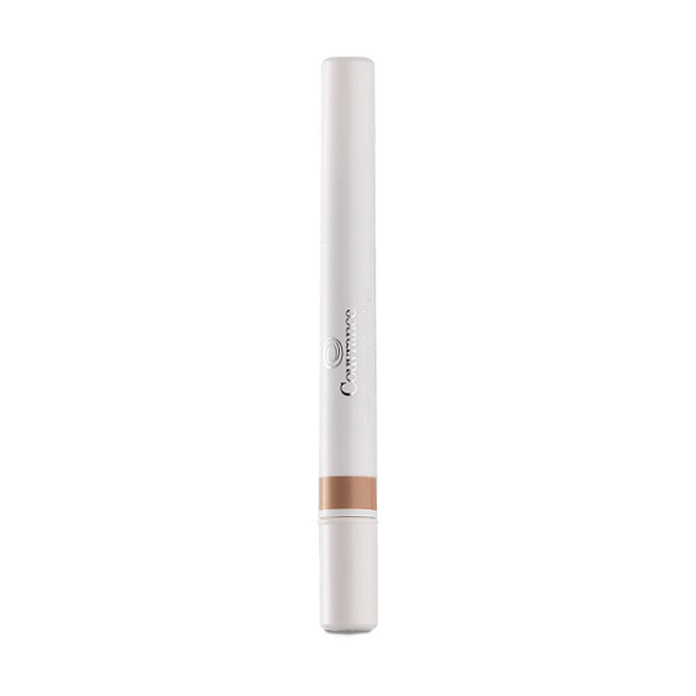Stylo blanc avec pointe beige. Inscription : Couvrance.