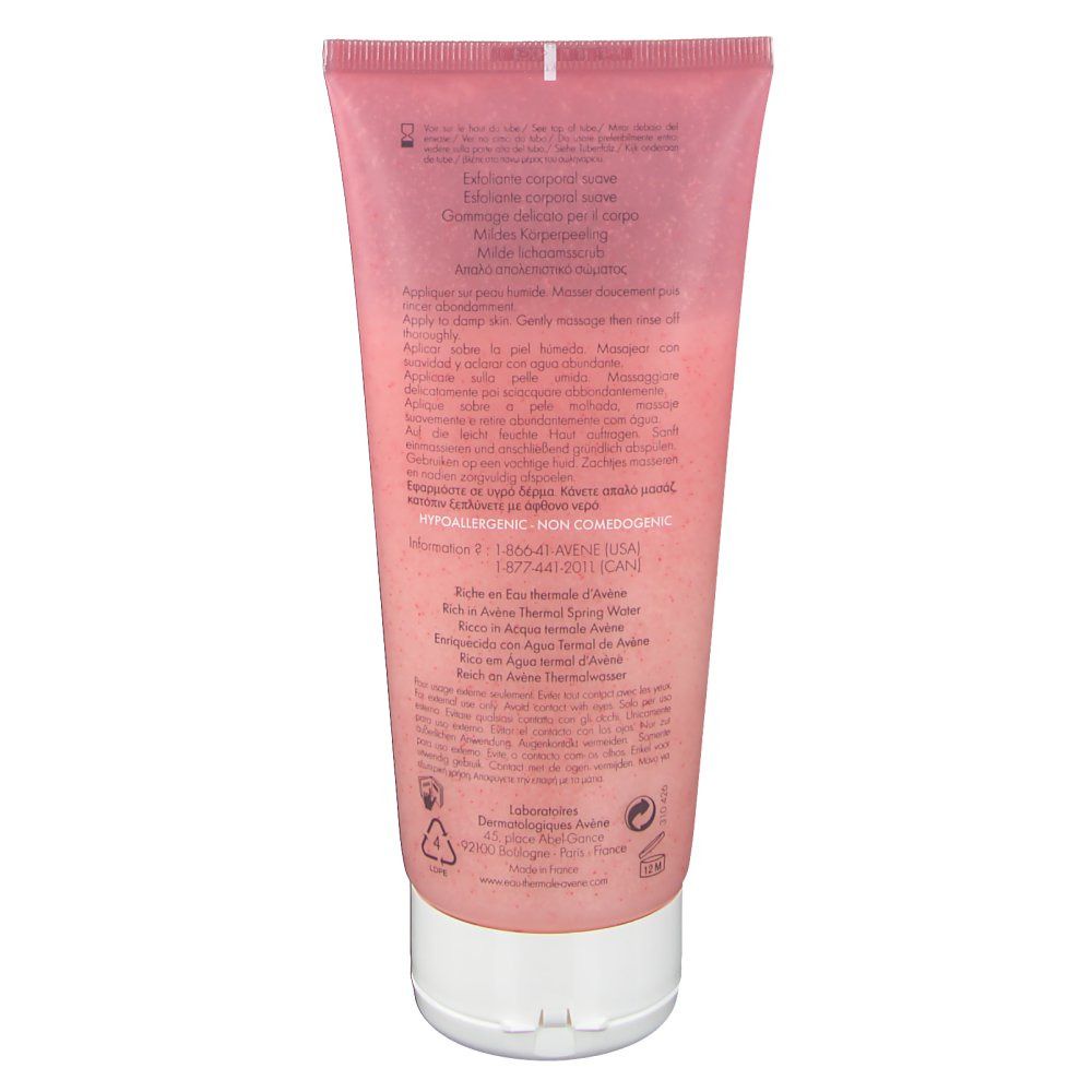 Dos d'un tube rose avec bouchon blanc. Texte en plusieurs langues, dont le français et l'anglais.