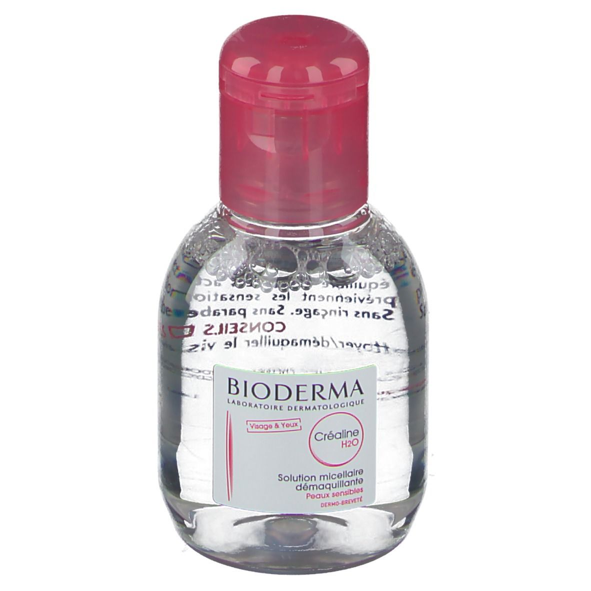 Petite bouteille ovale avec bouchon rose. Inscription: BIODERMA, Créaline H2O, Solution micellaire. Pour peaux sensibles.