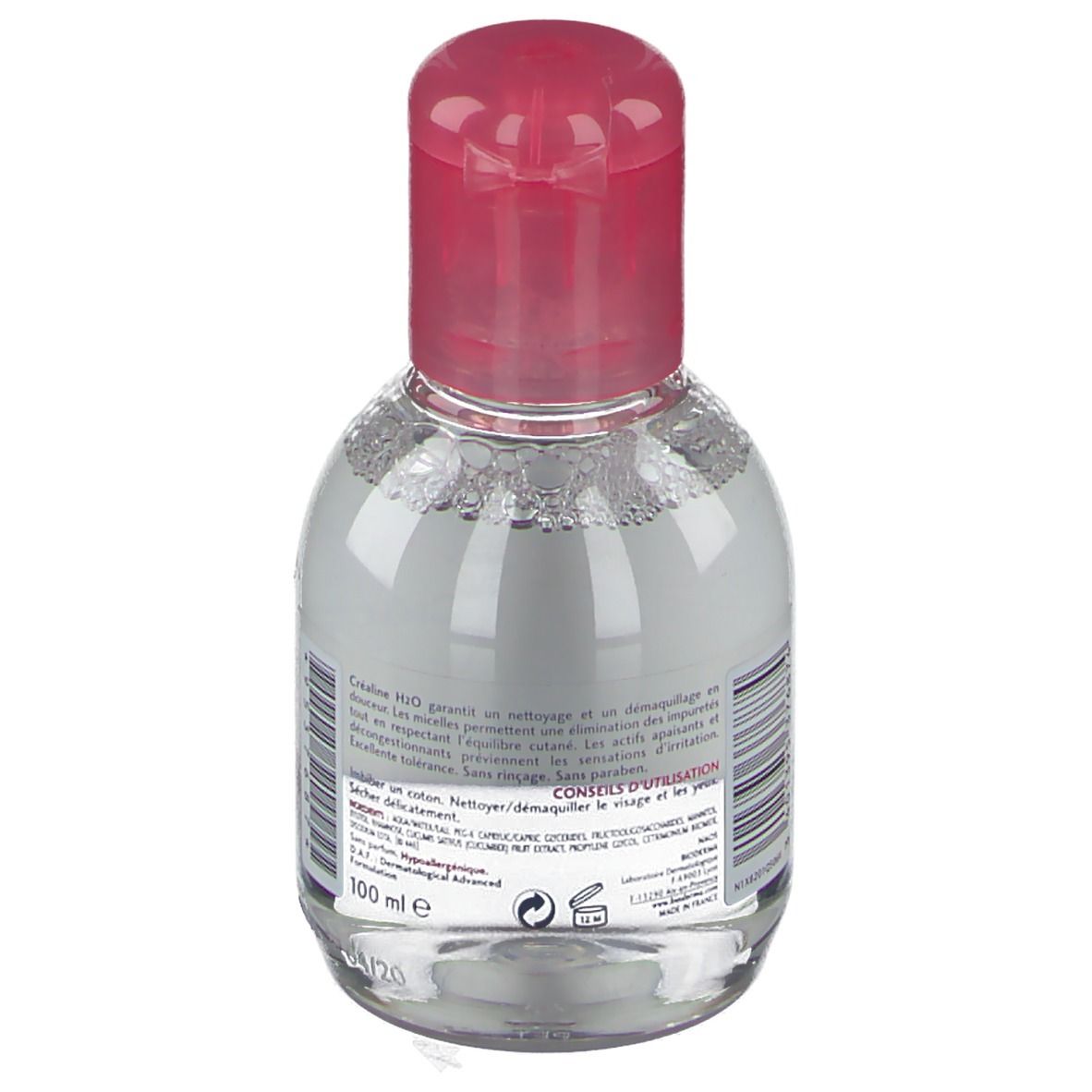 Dos de la petite bouteille ovale. Texte sur le nettoyage et le démaquillage. Volume: 100 ml.