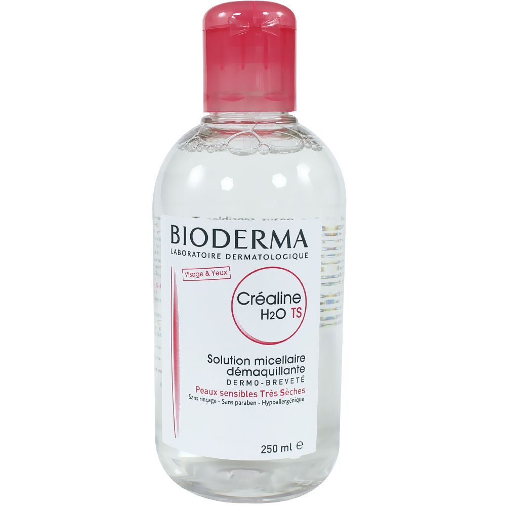 Flacon transparent, bouchon rose. Inscription Bioderma Créaline H2O TS. Solution pour peaux sensibles. 250 ml.