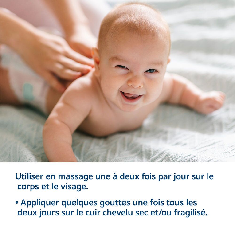 Bébé massé. Utilisation : une à deux fois par jour sur le corps et le visage. Texte en français.