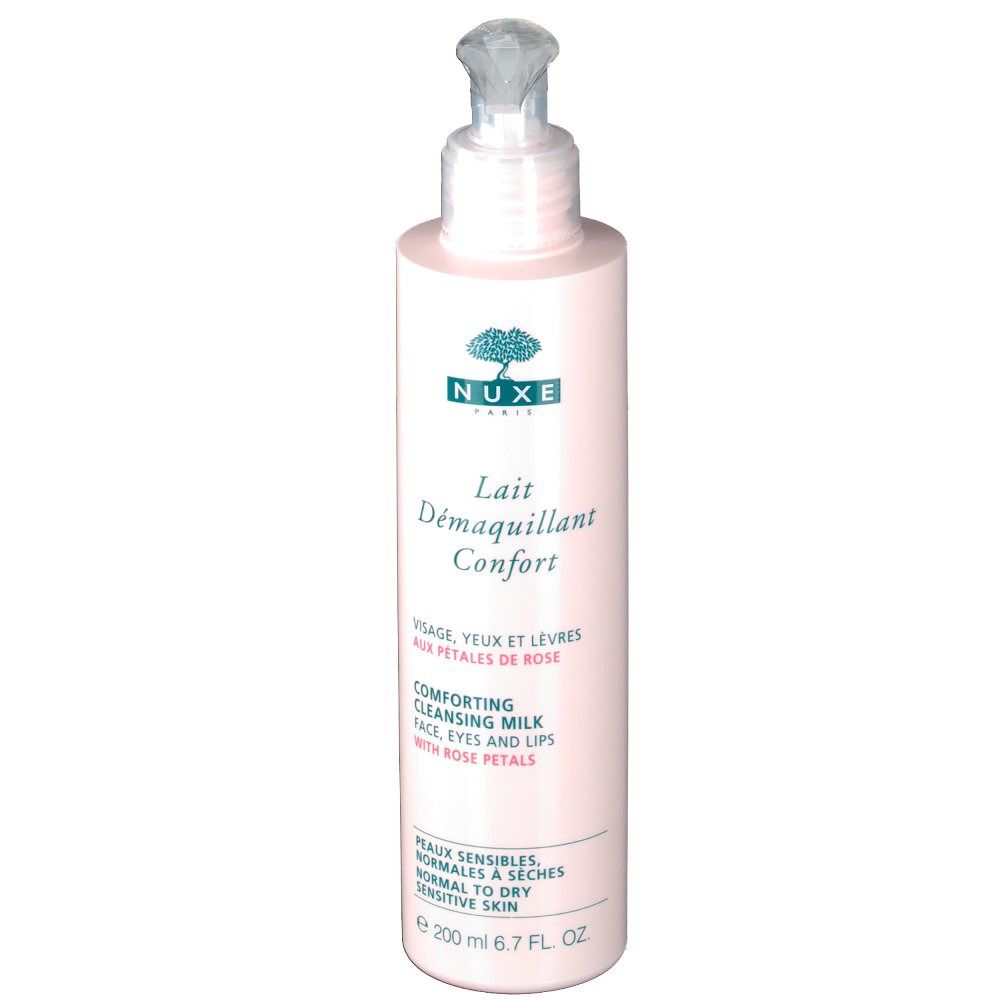 Flacon rose avec pompe. Inscription: Nuxe, Lait Demaquillant Confort, visage, yeux, lèvres. Textes en anglais et français. Pour peaux sensibles.