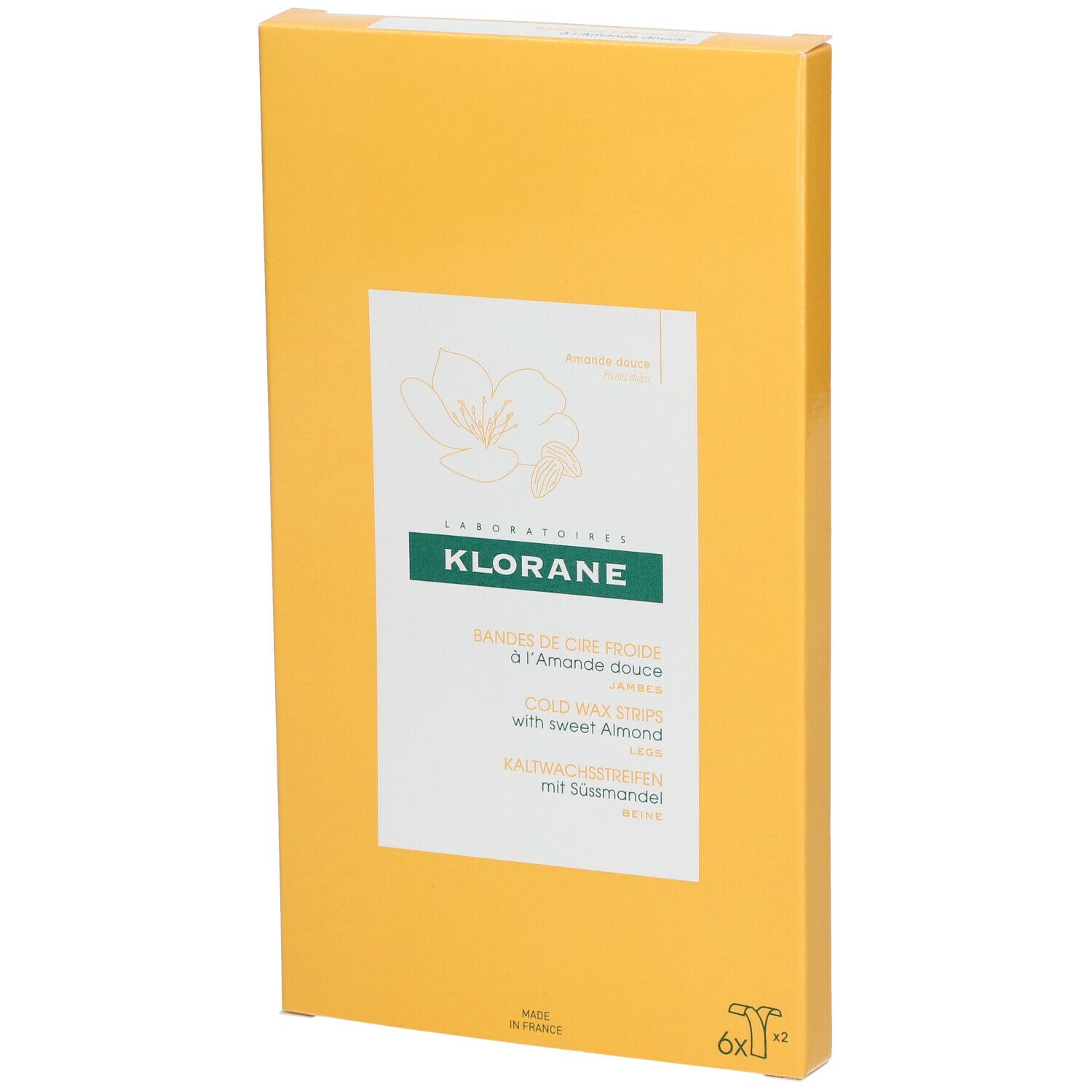 Boîte jaune en biais. Inscription: KLORANE, Bandes de cire froide à l'Amande douce, Kaltwachsstreifen mit Süßmandel.