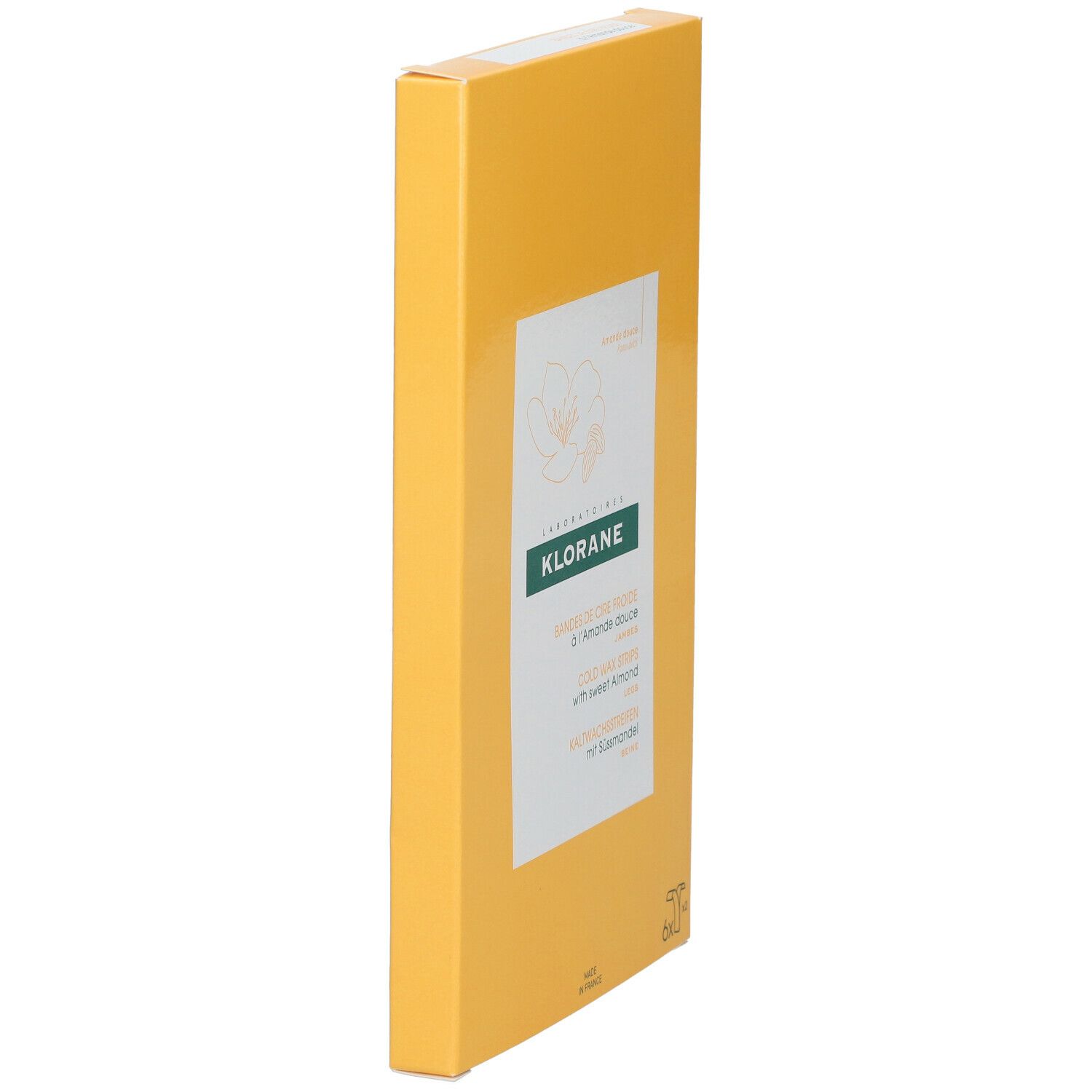 Boîte jaune en biais. Inscription: KLORANE, Bandes de cire froide à l'Amande douce, Kaltwachsstreifen mit Süßmandel.
