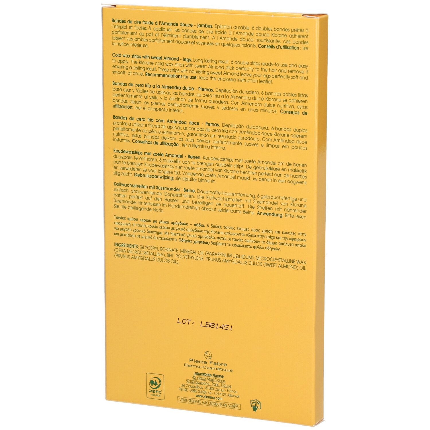 Dos de la boîte jaune. Texte en plusieurs langues. Ingrédients et informations du fabricant.