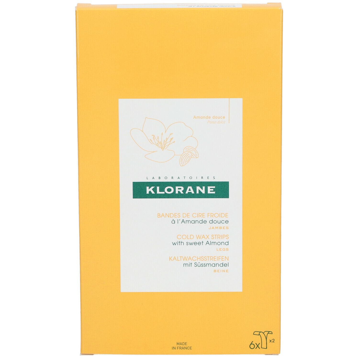 Boîte jaune en biais. Inscription: KLORANE, Bandes de cire froide à l'Amande douce, Kaltwachsstreifen mit Süßmandel.