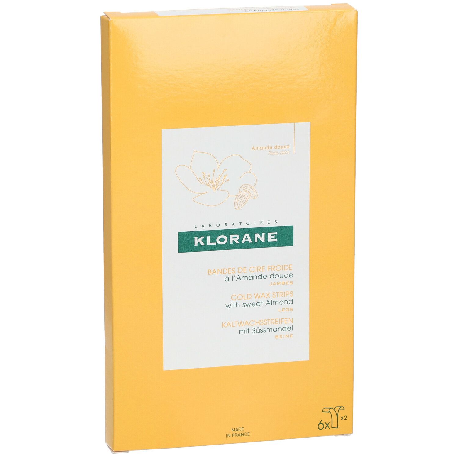 Boîte jaune en biais. Inscription: KLORANE, Bandes de cire froide à l'Amande douce, Kaltwachsstreifen mit Süßmandel.