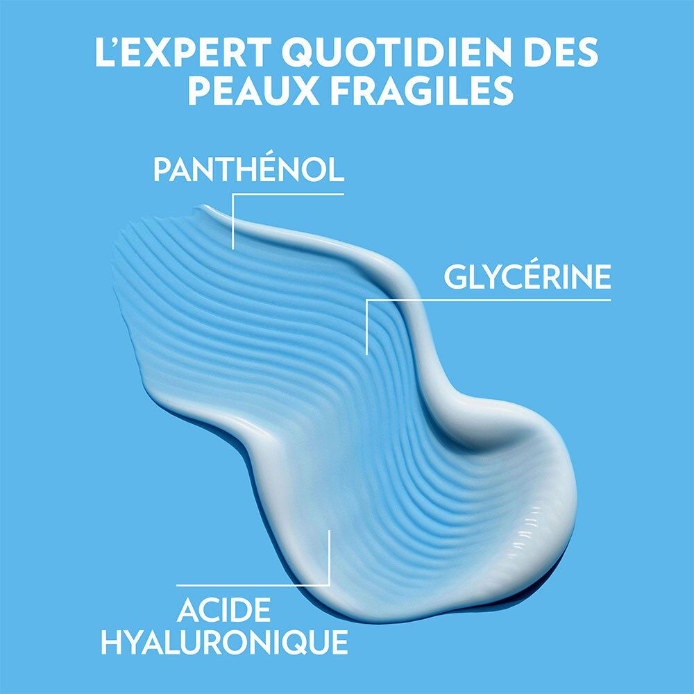 Produit blanc sur fond bleu. Texte: Panthenol, Glycérine, Acide Hyaluronique.