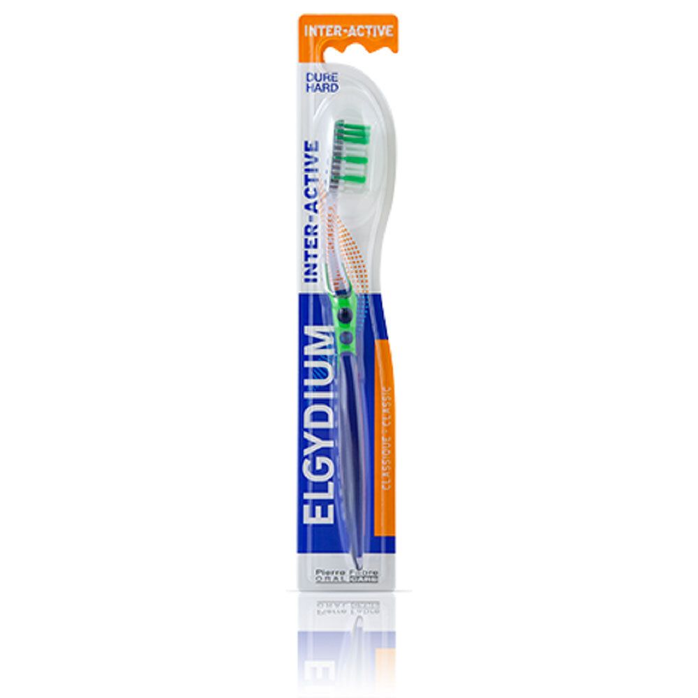 Brosse à dents bleue et transparente. Soies vertes. Emballage avec nom du produit et de la marque.