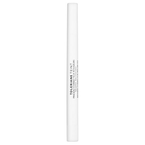 Stylo blanc avec texte: TOLÉRIANE TEINT. Correcteur de rougeurs. Informations produit.