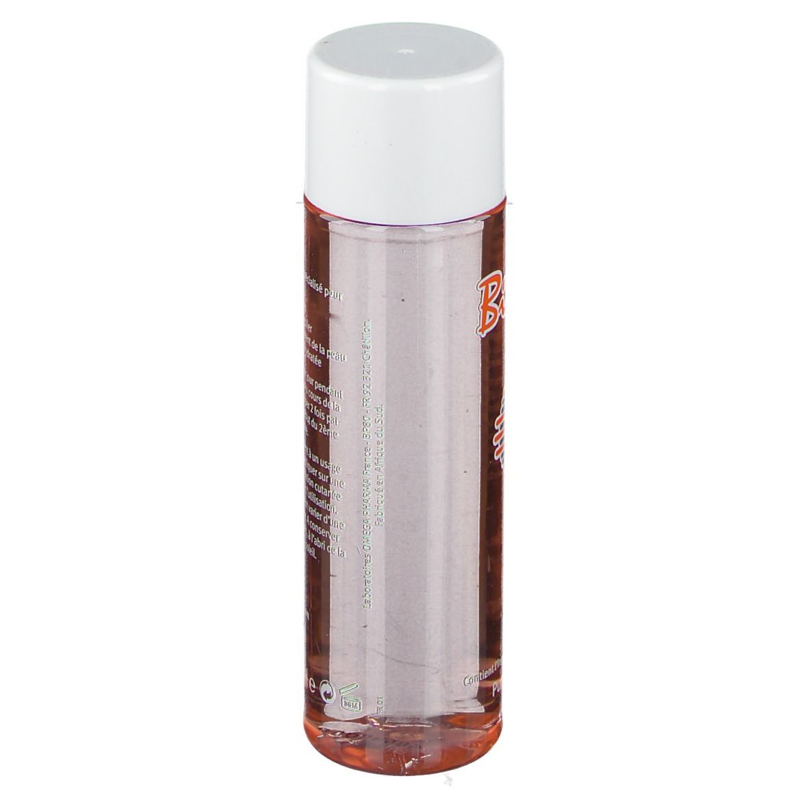 Flacon de Bi-Oil. Forme cylindrique, liquide transparent, bouchon blanc. Étiquette du produit partiellement visible.