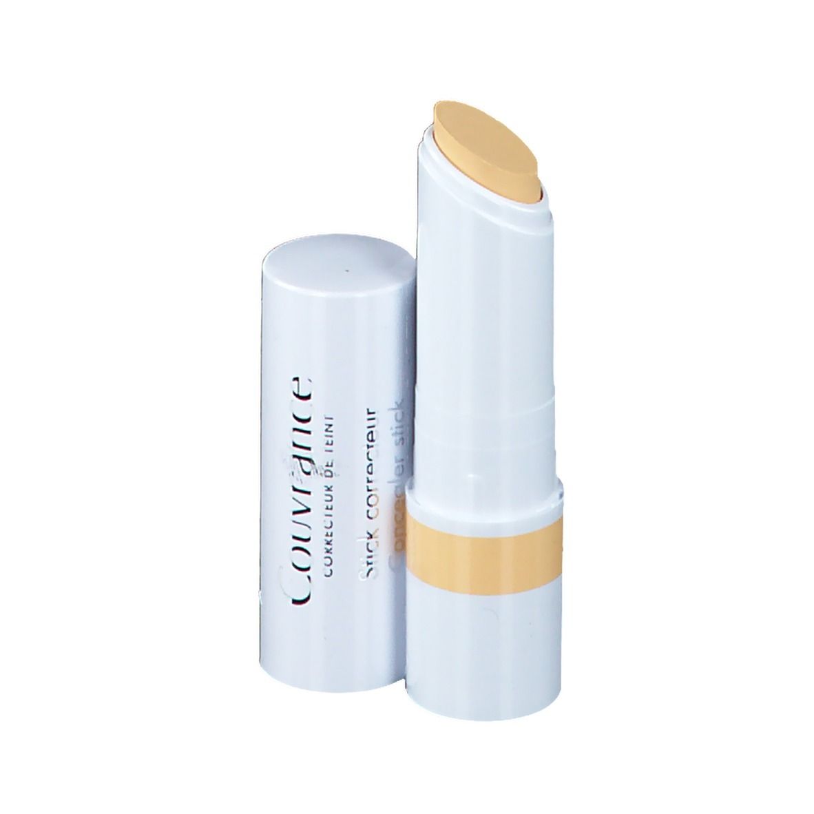 Stick correcteur jaune, bâton blanc avec produit jaune. Capuchon à côté.