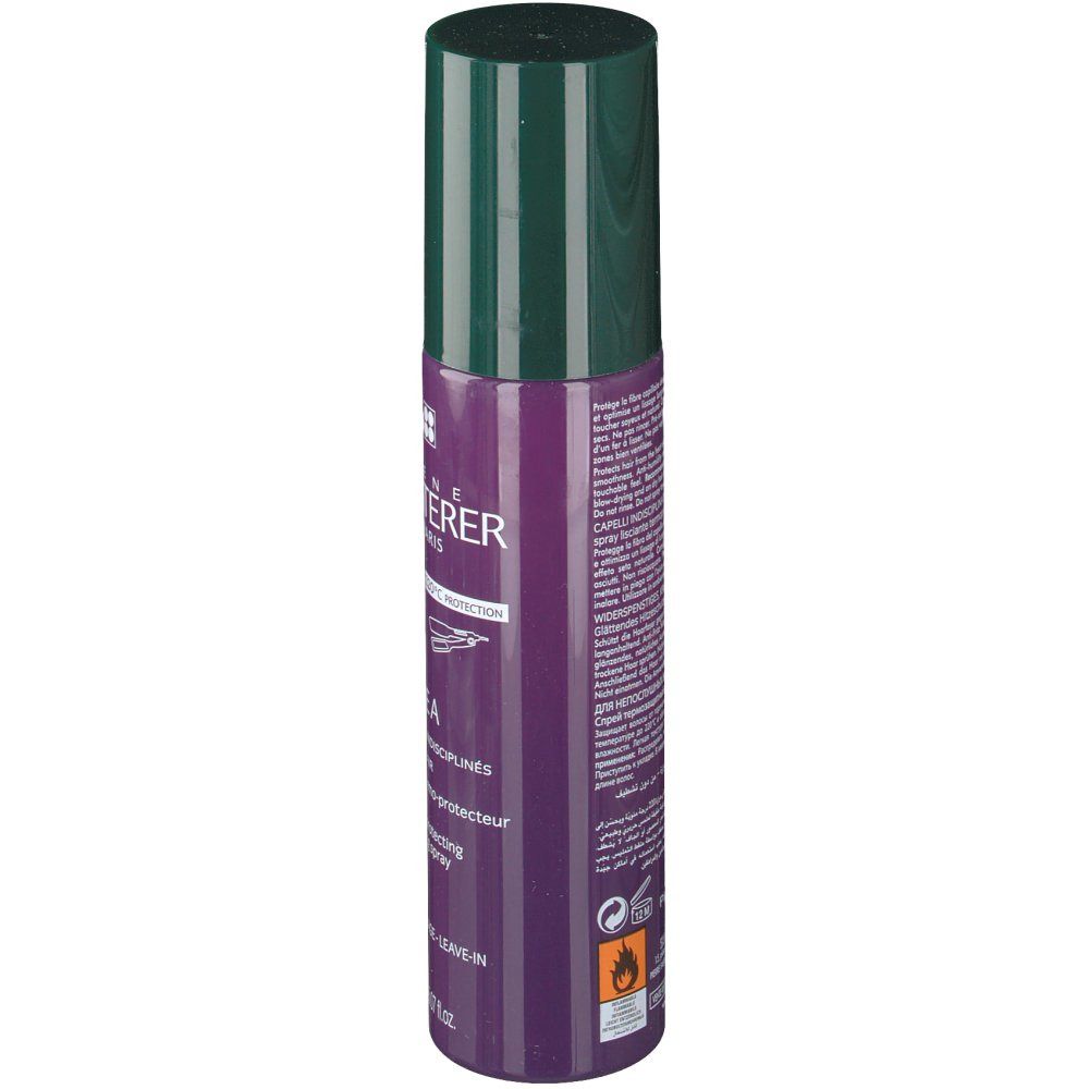 Flacon cylindrique, bouchon vert. Étiquette violette avec texte. Inscription: FURTERER. Spray thermo-protecteur.