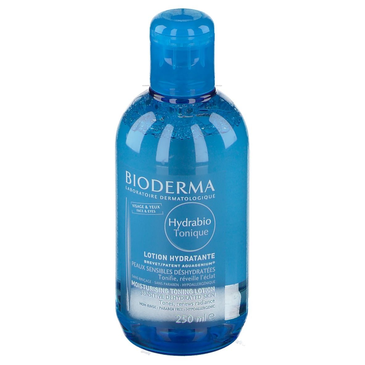Flacon bleu transparent avec bouchon bleu. Inscription: BIODERMA, Hydrabio Tonique, Lotion Hydratante. Pour le visage et les yeux.