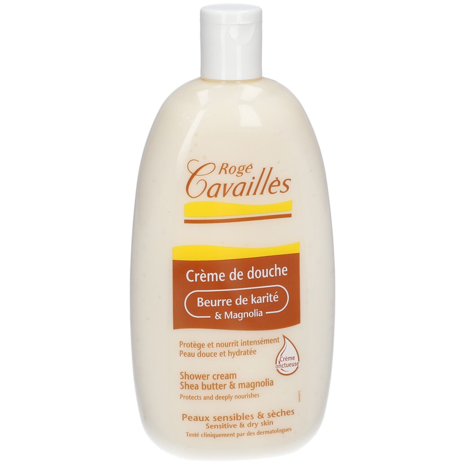 Flacon de crème de douche. Logo Rogé Cavaillès. Texte : Crème de douche, Beurre de karité & Magnolia. Pour peaux sensibles. Flacon blanc à bouchon rabattable.