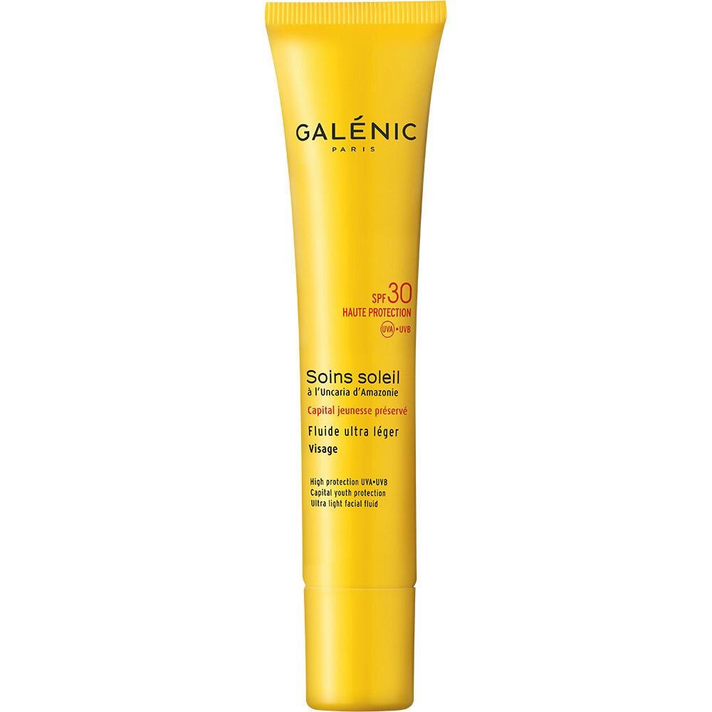 Tube jaune. Inscriptions: Galénic, SPF 30, Soins soleil. Bouchon à vis.