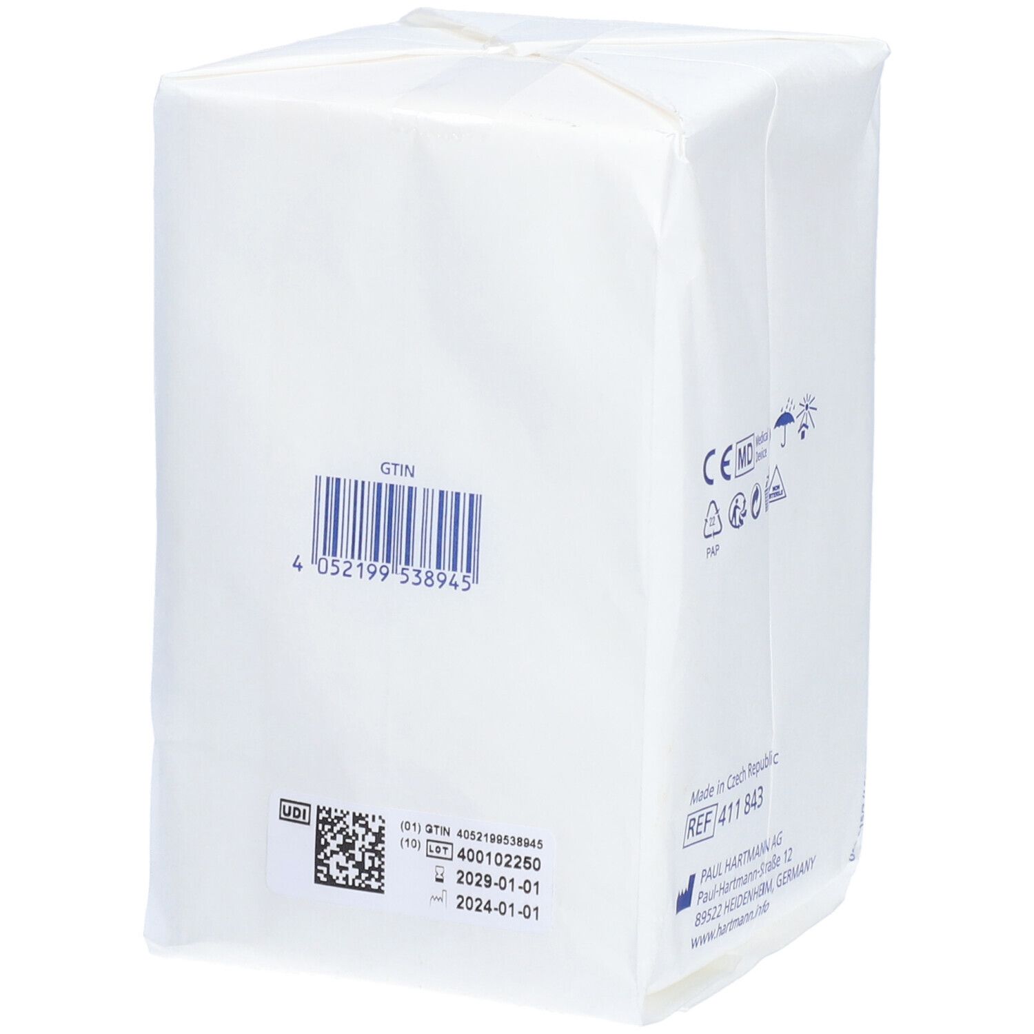 Dos de l'emballage des compresses Médicomp®. Code GTIN, code QR et date de péremption. Fabriqué en République tchèque.
